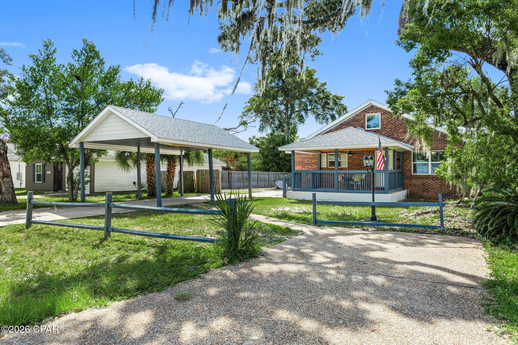 Completely remodeled and ideally located near St. Andrews and the beautiful beaches of Panama City, this unique property offers the perfect combination of modern living, flexibility, and income potential.

The main home has been thoughtfully renovated throughout, featuring a beautifully updated kitchen with crisp white cabinetry, quartz countertops, modern fixtures, and plenty of workspace. The original brick exterior adds character while the spacious covered front porch offers the perfect spot to enjoy the Florida lifestyle.

The real standout is the detached garage with a beautifully finished mother-in-law/guest suite above. This versatile space can accommodate extended family, guests, a home office, or continue as a short-term rental. Currently operated as an Airbnb, the suite is on pace to generate approximately $20,000 in rental income in 2026, according to the seller.

Adding even more value, the property features paid-for solar panels, offering the potential for long-term energy savings without an outstanding solar loan.

With a remodeled main home, detached garage, finished guest suite, income-producing potential, paid-for solar, and a location just minutes from St. Andrews, local restaurants, shopping, and the Gulf beaches, 1905 Grant Ave is a rare opportunity for both lifestyle and versatility.