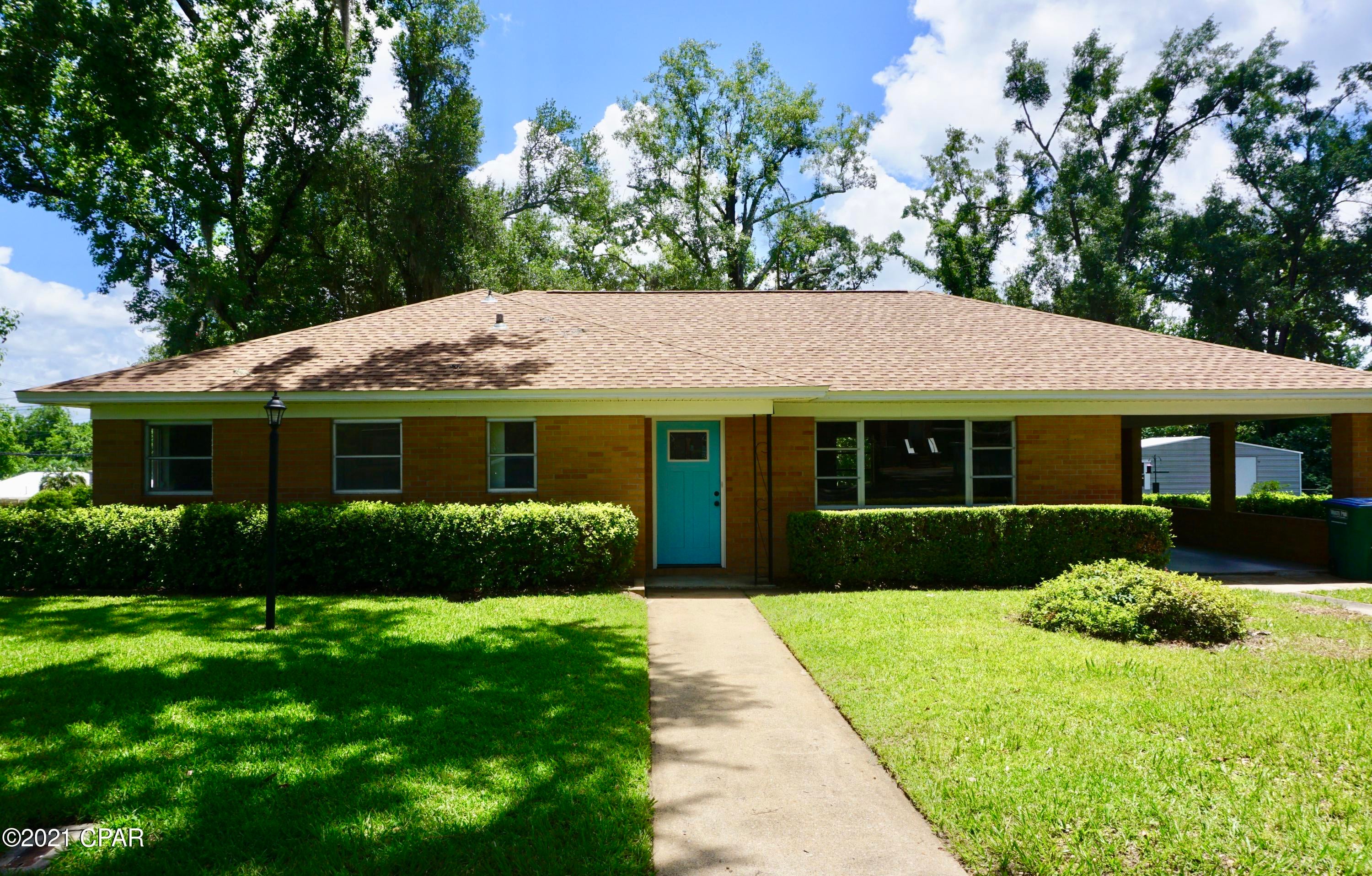 Get the look and feel of a new-build without the sky-rocketing costs of construction! This fantastic 2/2 home is located in the heart of quaint Chattahoochee on an oak-lined canopy road dotted with well-kept and renovated homes.  This latest renovation for W Marion Street offers a full upgrade of the entire home, while maintaining much of the character and appeal of the original. The home is nestled on a large and well-maintained corner lot. Kitchen features new countertops, tile backsplash, and all new stainless steel appliances and gas range. A cozy keeping room with fireplace is located just off the kitchen – a perfect spot for a coffee bar or reading nook. The rear of the home has a Florida-room with original jalousie windows – a great character point for the home. Bathrooms have been completely remodeled with updated tile and fixtures. Roof and HVAC were recently replaced. Home has a new tankless water heater and new plumbing and electrical.  All flooring, fixtures, and paint are new. There is an attached covered carport.  Outdoor utility room and attic space offer an abundance of storage. This house is a must-see and provides all the new-home feel without the new-construction price!