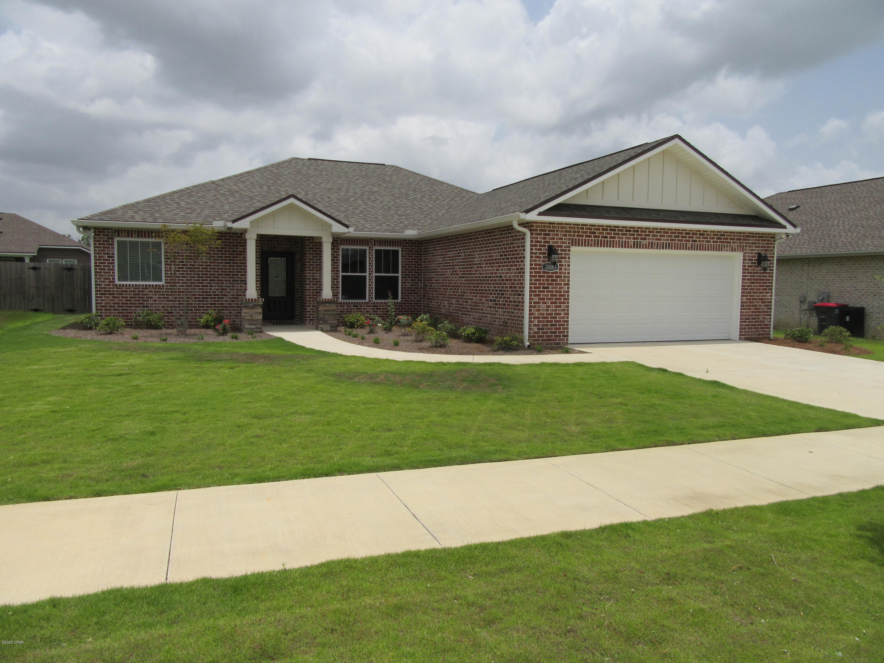 Beautiful 4/2 in just opened Cedar Park subdivision offering easy access to greater Panama City, Panama City Beach, shopping, dining, schools and TAFB! All brick home offers great room with 10 ft ceilings, formal dining room, kitchen with island, solid surface counters, and stainless appliances, master suite with tray ceiling, double vanity, separate shower and tub, walk-in closet. Other interior features include tile flooring, fireplace, recessed lighting, custom cabinetry, and ceiling fans.Exterior includes brick siding, 2 car garage, covered porch, and sprinkler system. Cedar Park features landscaped entrance,underground utilities, custom street lighting, and sidewalks with a park area and pavilion-All listing info should be verified.All property sizes and ages are approximate, please m easure and/or verify if important. School assignments are subject to change, please check with Bay County for most accurate information. Deposit is the same as one month's rent. Pets allowed with owner approval and a $150.00 NON-REFUNDABLE pet fee applies per pet. Breed restrictions apply.