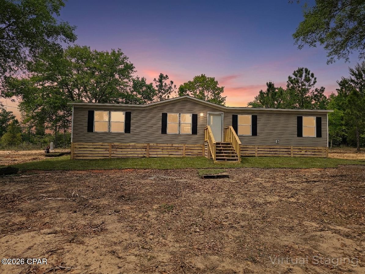 Brand-new 2026 '' The OAK'' manufactured double-wide home in Compass Lake in the Hills.This 1475 square foot residence offers a bright, modern layout with four bedrooms and two baths, designed for comfort and efficiency. This home is conveniently located about 30 minutes from Panama City. Contact your agent for more information. 
All measurements to be verified by buyer.