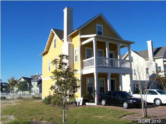 Located in Harrison's Walk, this is a spacious 4 bedroom home. Community features community pool, and just a short distance to the beach. Very close to shopping, dining and minutes from Pier Park. The home features travertine flooring, fire place, master bath with separate tub and shower, and the third floor could be used as separate living quarters with private room and bath.