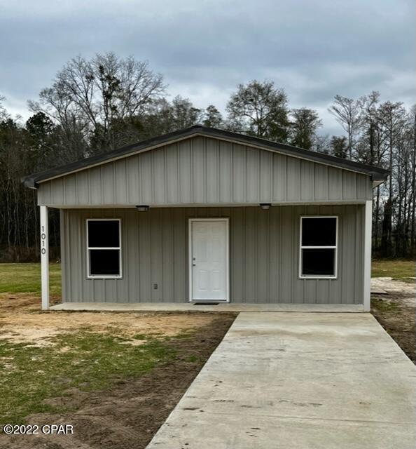 CURRENTLY UNDER CONTRACT, SELLER NEW CONSTRUCTION!!! Construction has just begun on this Energy Efficient home which is being constructed with all steel framing on interior and exterior. All metal is eco-friendly and is 67% recycled. It features a metal roof, metal siding, side by side refrigerator with water & ice maker, central heat/air with heat pump, an electric On Demand water heater, Whirlpool appliances and stained concrete floors. Home meets all current Florida building and energy codes and qualifies for some of the lowest insurance rates in our area!!! Home features include a 14 x 15 metal outbuilding, spacious front porch, and a concrete parking pad with sidewalk and side entrance for convenient unloading of groceries into the kitchen.