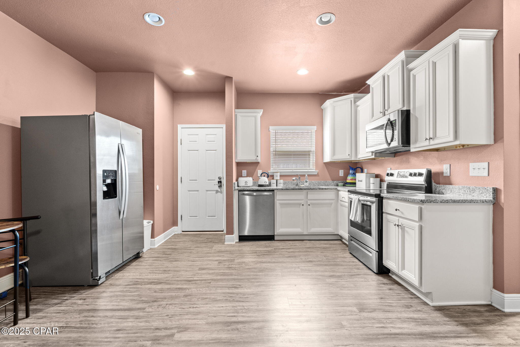 **PLEASE NOTE: UTILITIES INCLUDED. The house is NOT pink. It's a boho Mauve/Brown color. This home is connected to another house and it is a duplex-style set up.** Small breed dogs under 25 lbs and Cat Friendly. This cozy one bedroom/one bath home in Bridge Harbor is the perfect boho retreat equipped with a full kitchen, laundry space, and full bath. This home comes partially furnished all appliances and a 50 in TV in the living room. Utilize what is provided but feel free to add your personal touches to make this place home! Bridge Harbor is located only 5 miles to Tyndall AFB and 17 miles to Panama City Beach. The community is also home to a wonderful community pool and a pavilion and outdoor grills to enjoy.