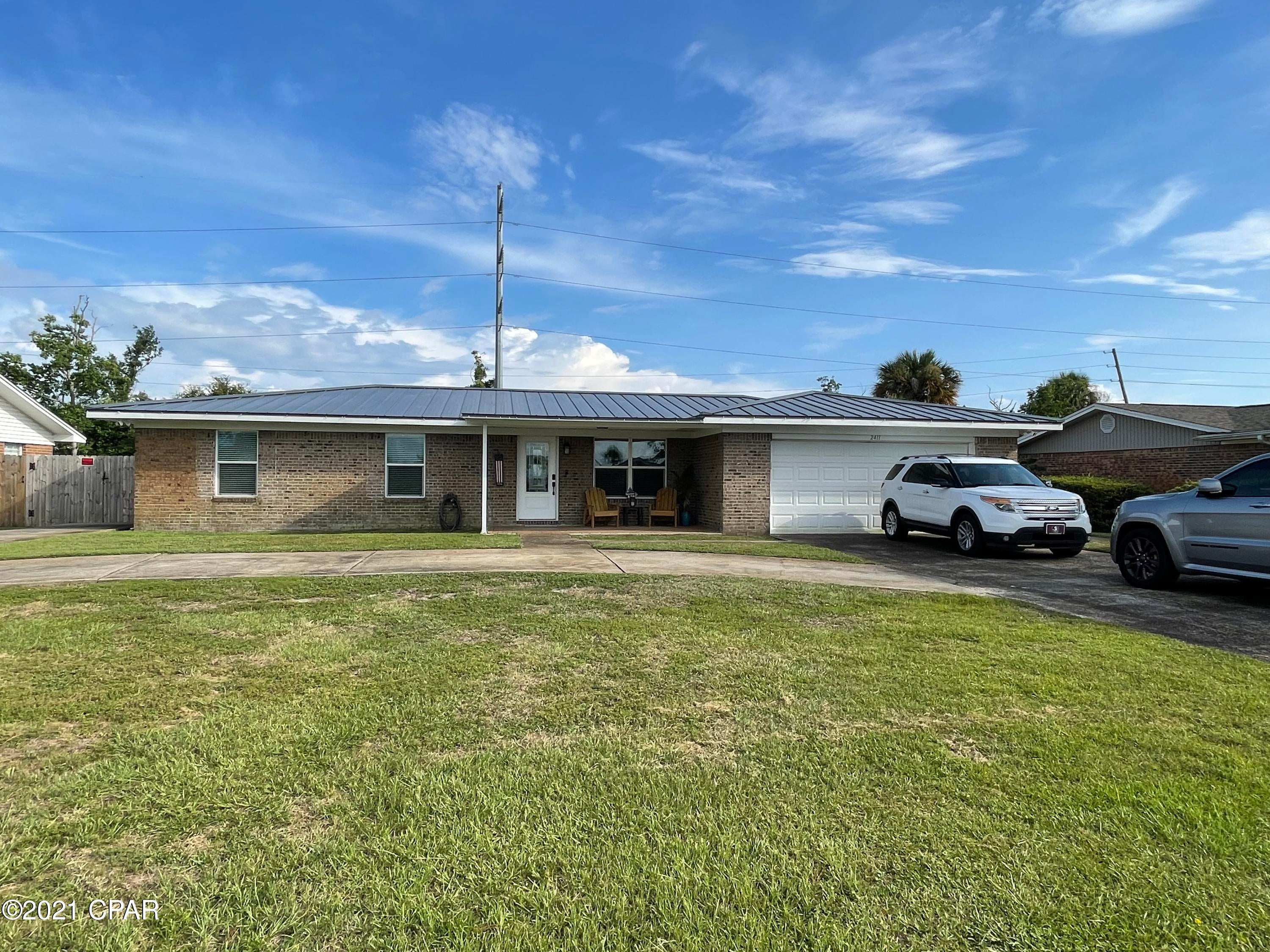 Under contract-taking back up offers.This is a must see home! Interior was taken down to the studs after Hurricane Michael. Plumbing, electric, HVAC, tankless electric hot water heater, roof, flooring, windows, cabinets, and appliances installed after hurricane.  Countertops and beautiful quartz with a farmhouse sink and coffee bar. Gorgeous pantry and huge laundry room have glass paneled barn doors. There is a Ring security system and it is smart house capable. The backyard is huge with a 6ft privacy fence and an 8 ft fence across the back. The large sunroom doesn't have new windows but is heated and cooled with a window unit and space heater. Measurements are approximate and should be measured if important.