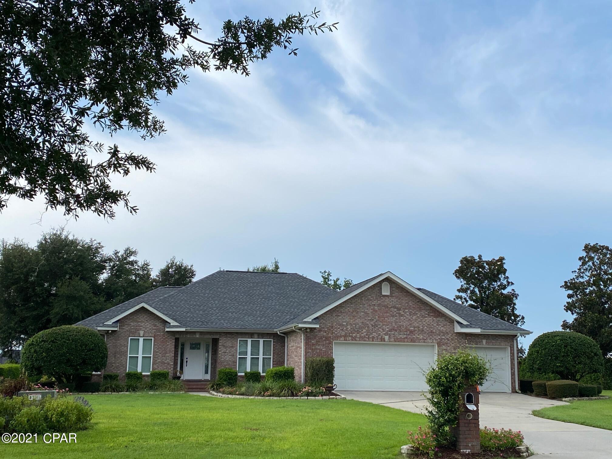 Gorgeous 3 bedroom, 2 bath brick home in Spring Chase Subdivision.  Very open & spacious with windows overlooking the backyard from the living room and breakfast area.  Kitchen has custom cabinets with granite counters.  Split bedroom floor plan.  The master suite has a sitting area, walk-in closet, double vanity & step in tile shower.  Three car garage plus a carport.  Beautiful landscaping.
