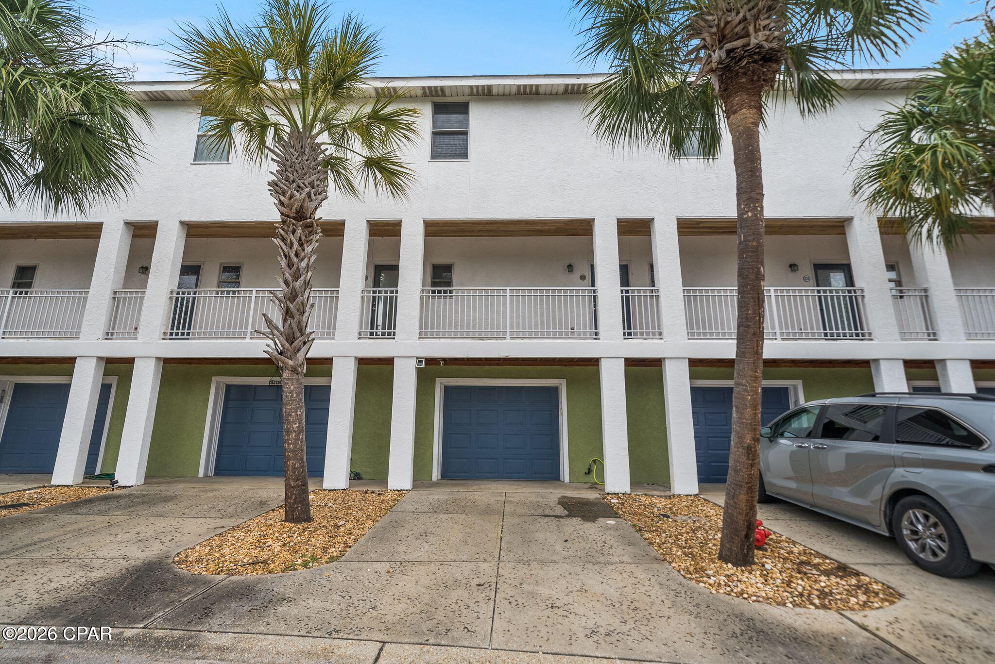 Tucked into the heart of the East end of Panama City Beach, this charming townhome just steps from the beach offers an easy entry point into one of Florida's most in-demand coastal markets. With just over 1,000 square feet, the 2-bedroom, 2-bath layout delivers comfortable, low-maintenance living well suited to long-term renters, second-home buyers, or investors looking to capitalize on strong short-term rental demand.

The incoming producing and turn-key vacation rental has a location that offers the best of both worlds. A quiet, tucked-away neighborhood setting that still keeps you minutes from the beach, the lagoon, and local shops and restaurants. Mornings start with easy access to coffee and sand, afternoons are made for cruising to nearby favorites, and evenings bring you back to a peaceful community away from the crowds.

Community amenities add to the appeal, including a community pool, a community room, and boat slips available on a first-come, first-served basis. Inside, the home features a functional floor plan, a private garage, and a cozy, manageable footprint that makes it easy to maintain whether you're living here full-time or renting it out.

This is an affordable opportunity to own in Panama City Beach with genuine rental upside. This unit has been rented for 4 straight years and offers over $30,000 in gross rental income.

Great deal as a steady long-term rental, a personal beach escape, or an income-producing property when not in use. Location, lifestyle, and value come together in this well-positioned coastal retreat.