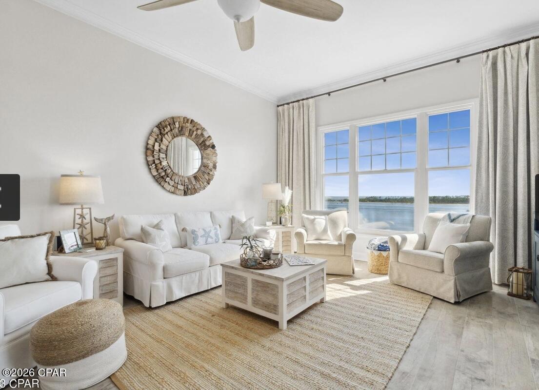 Rare TOP FLOOR (8th) opportunity at Reflections in the Bay Point community! This tastefully furnished condo offers unobstructed views of St. Andrews Bay. Enjoy your morning coffee or unwind at the end of the day from your private balcony while taking in the ever changing scenery. Watch the dolphins  play and eagles and osprey soar, boats cruise through the channel, and enjoy panoramic views of St. Andrews State Park and Shell Island. 

Inside, natural light fills the open living space, highlighting the coastal décor and gorgeous wood plank ceramic tile flooring. The kitchen features stainless steel appliances and flows seamlessly into the dining and living areas, making it easy to entertain while enjoying the view. The primary suite offers a walk-in shower, dual-sink vanity, and a relaxing retreat after a day on the water. The upgrades in this unit make it one of a kind. The quartz countertops and extras simply speak luxury!

Being sold fully furnished, this condo is ready to enjoy from day one. Whether you're looking for a full-time residence, a vacation getaway, or an investment opportunity, short-term rentals are allowed, offering excellent income potential and flexibility.

Reflections offers outstanding amenities, including a lagoon-style pool, hot tubs, community grilling areas, fire pits, an owner's lounge, and beautifully maintained grounds, all within the Bay Point community.

From sunrise to sunset, the views of St. Andrews Bay create a view that's never the same twice, making this a place you'll love coming home to or sharing with your guests.