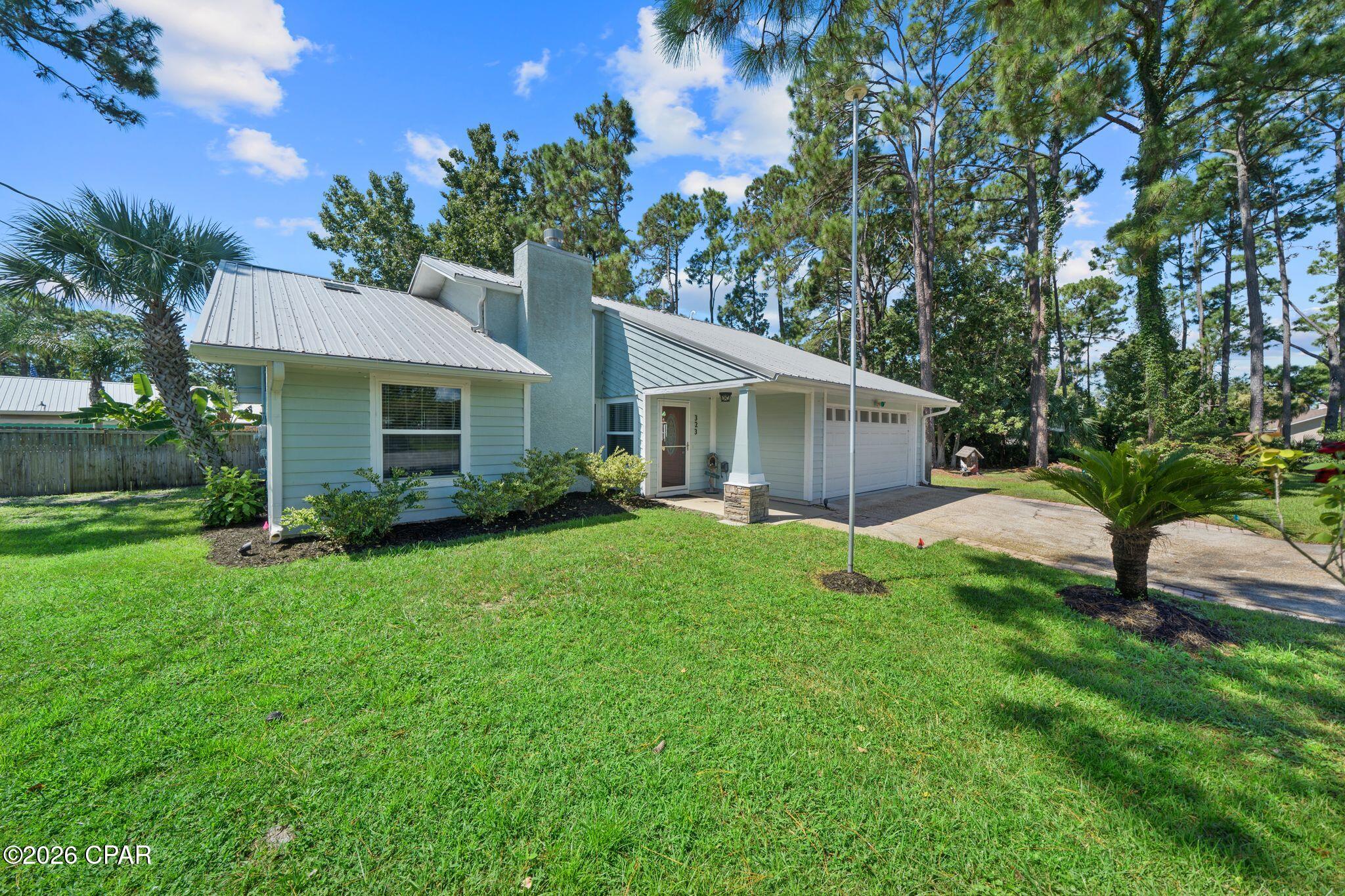 Move-in ready and fully renovated, this 3-bedroom, 2-bathroom home in Panama City Beach offers modern updates, a large backyard, and a convenient location near the beach, marina, Navy base, shopping, dining, and everyday conveniences.

Inside, you'll find new flooring, fresh interior paint, updated lighting, shaker-style trim throughout, and vaulted ceilings in the main living area that create an open and inviting feel. The updated kitchen features new quartz countertops and newer stainless steel appliances, making it perfect for both everyday living and entertaining.

The primary suite includes a beautifully updated bathroom with a tile shower and new vanity. Updated windows throughout the home add to the refreshed, move-in-ready feel.

One of the standout features of this property is the oversized backyard one of the largest yards in the neighborhood. There is plenty of outdoor space for entertaining, pets, play areas, gardening, boat or recreational storage, or the possibility of adding a future pool.

Located just a few short miles from Captain Anderson's Marina, this home puts boating, fishing, and the Panama City Beach lifestyle within easy reach. You're also only minutes from the white sand beaches, local restaurants, shopping, entertainment, and attractions throughout Panama City Beach.

For buyers looking for a home near Naval Support Activity Panama City, Gulf Coast State College, or Panama City, this location offers added convenience. The Navy base is nearby, and the Hathaway Bridge provides quick access to Gulf Coast State College, Panama City, and surrounding Bay County destinations.

If you've been searching for a renovated 3 bedroom home in Panama City Beach with a large backyard, updated kitchen and bathrooms, and easy access to the beach and marina, this property checks all the boxes.