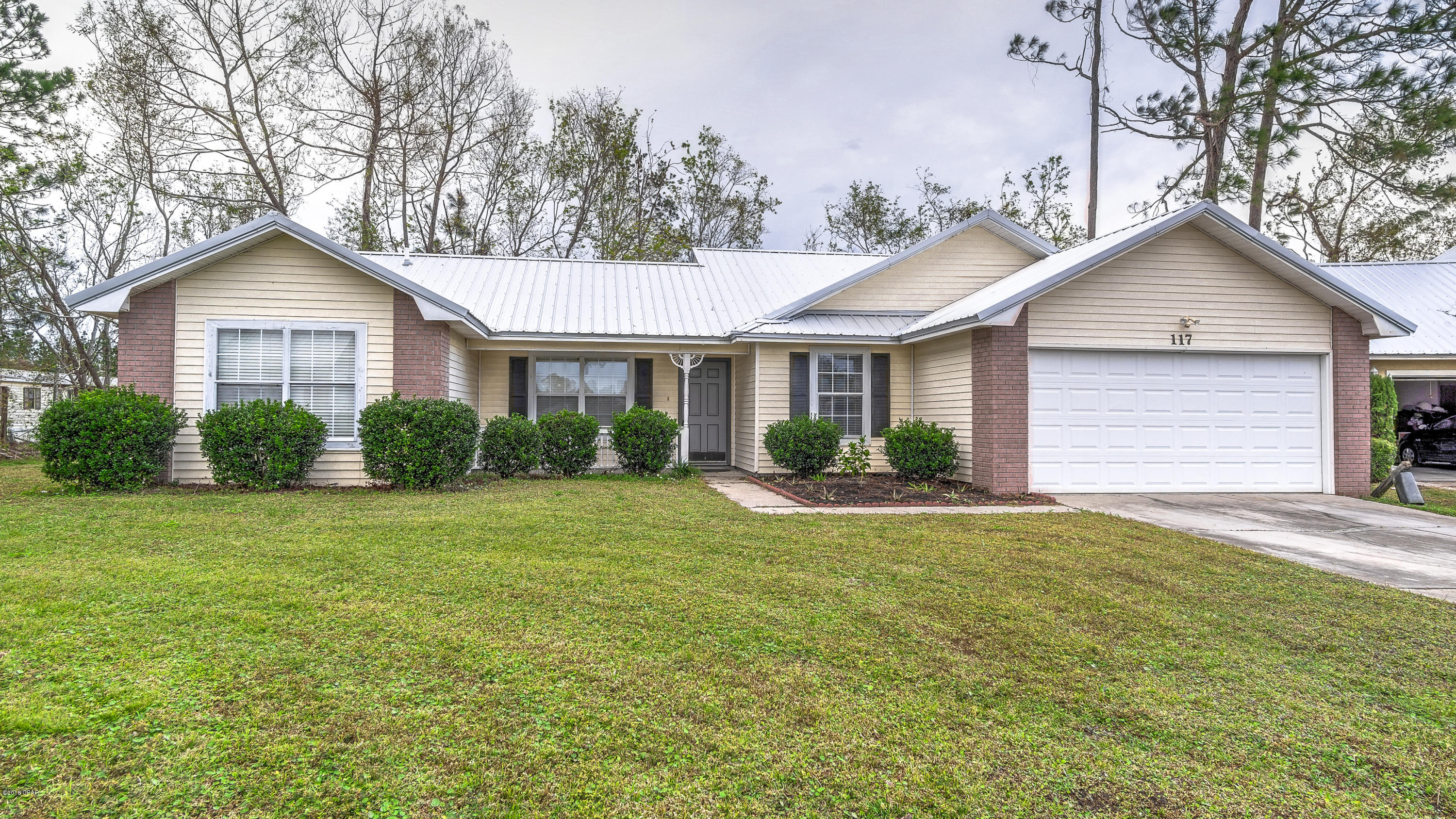 CURRENTLY UNDER CONTRACT, SELLER ACCEPTING BACKUP OFFERS - Brandywine Estates is located in a quiet subdivision in Panama City Beach close to the Navy Base and Hathaway bridge. Only a 2 mile drive to put your toes on the white sandy beach. This 3 bedroom, 2 bath single story home is nestled at the end of a cul-du-sac and features a split floor plan. Spacious master bedroom with plenty room for a king size bed and sitting area. Brand new- plush Berber carpet throughout the house and metal roof in 2016.  New rear privacy fence installed after hurricane. All measurements are approximated. Buyer to verify if important.