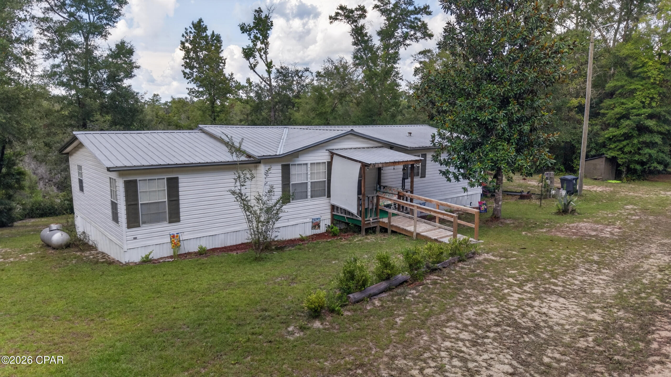 Peaceful Waterfront Retreat on 14.79 Acres

Escape to your own private slice of paradise with 14.79 beautiful acres featuring a one owner double-wide mobile home overlooking a peaceful branch of Gap Pond. Enjoy breathtaking views of the water from the back porch, where you can relax and take in the beauty and tranquility of nature.

This property offers access from two county-maintained roads, providing added convenience and flexibility.   There are plenty of opportunities for outdoor enthusiasts, with fishing right on the property and abundant space for hunting and exploring. Whether you're looking for a private getaway, recreational property, or a place to make your own, this unique acreage offers peaceful country living surrounded by natural beauty.

Come experience the quiet, scenic setting and endless possibilities this property has to offer!


Adjoining 6.27 acres is available to purchase.  Also listed MLS#794491

Measurements should be verified by buyer.