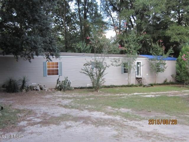 Single wide manufactured home on 0.55 acres near town of Bascom. Three bedroom, two bath, living room and kitchen/dining. Home has a new roof just completed. Home will need a well drilled as it has been getting water from a neighbor. There is a septic tank. Home is a 2002 Belmont, model 16441, made in Mississippi. Bring offers.