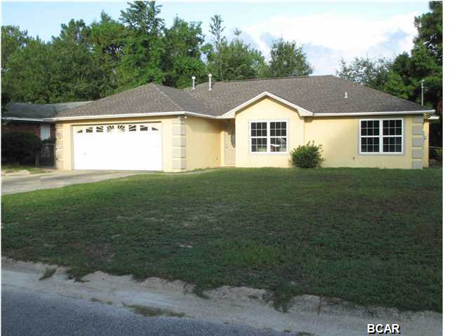 Beautiful completely remodeled home with a new roof, hvac, windows kitchen cabinets granite countertops truly a must-see