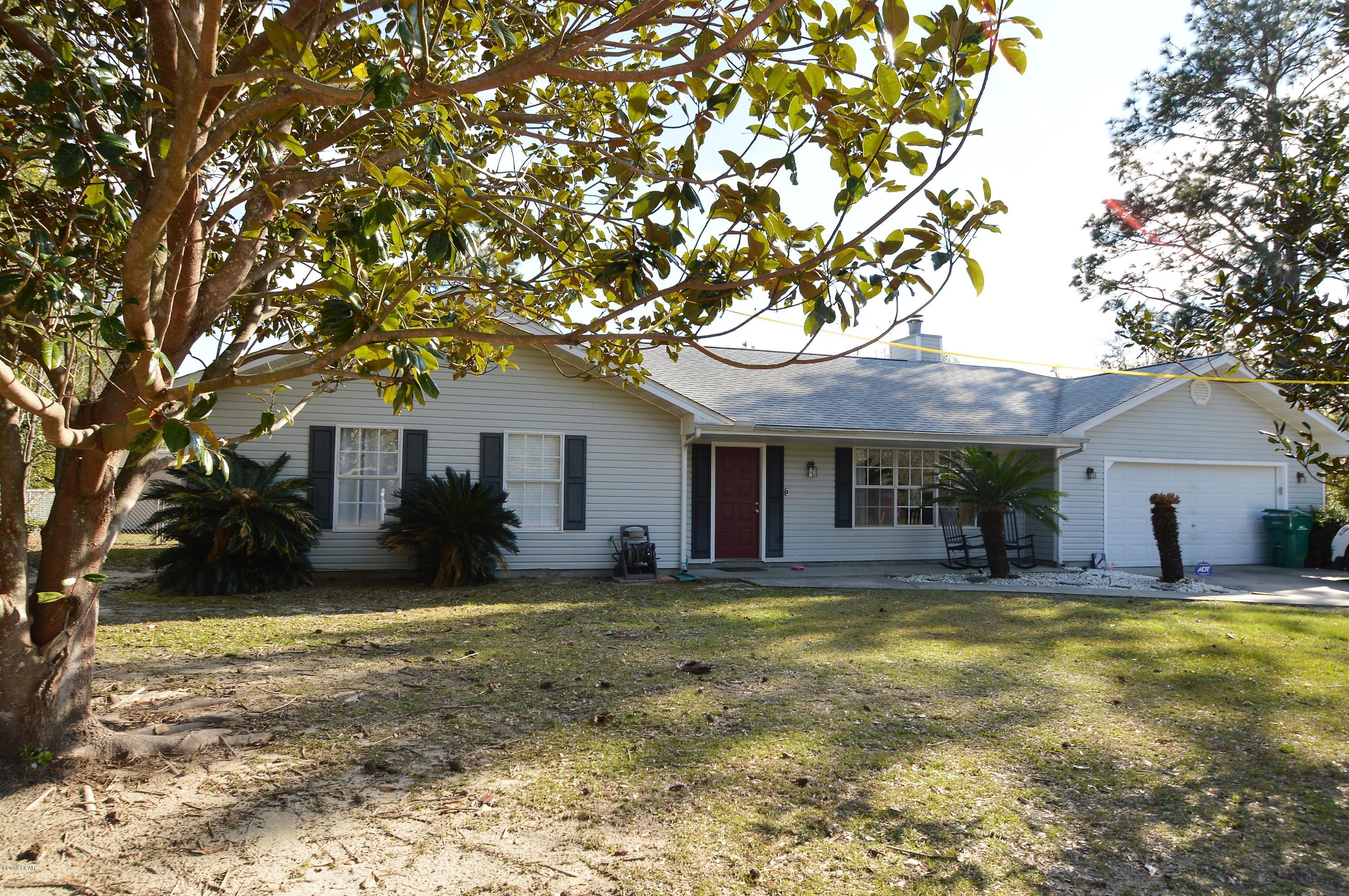 Looking for a nicely updated home in Sunny hill's...Sitting on the 17th Hole.

Large living room with gas fireplace, leads to dining area. kitchen has cute white cabinets, copper apron sink, gas 5 burner stove stainless steel dishwasher and fridge. Kitchen is open to Den with lots of window for natural light. Laundry room has pantry storage. 3 bedrooms 2 full baths. Nice screen porch overlooking chain link back yard. Garage has nice  size storage room that's house well tank hot water heater, plus other built in storage.