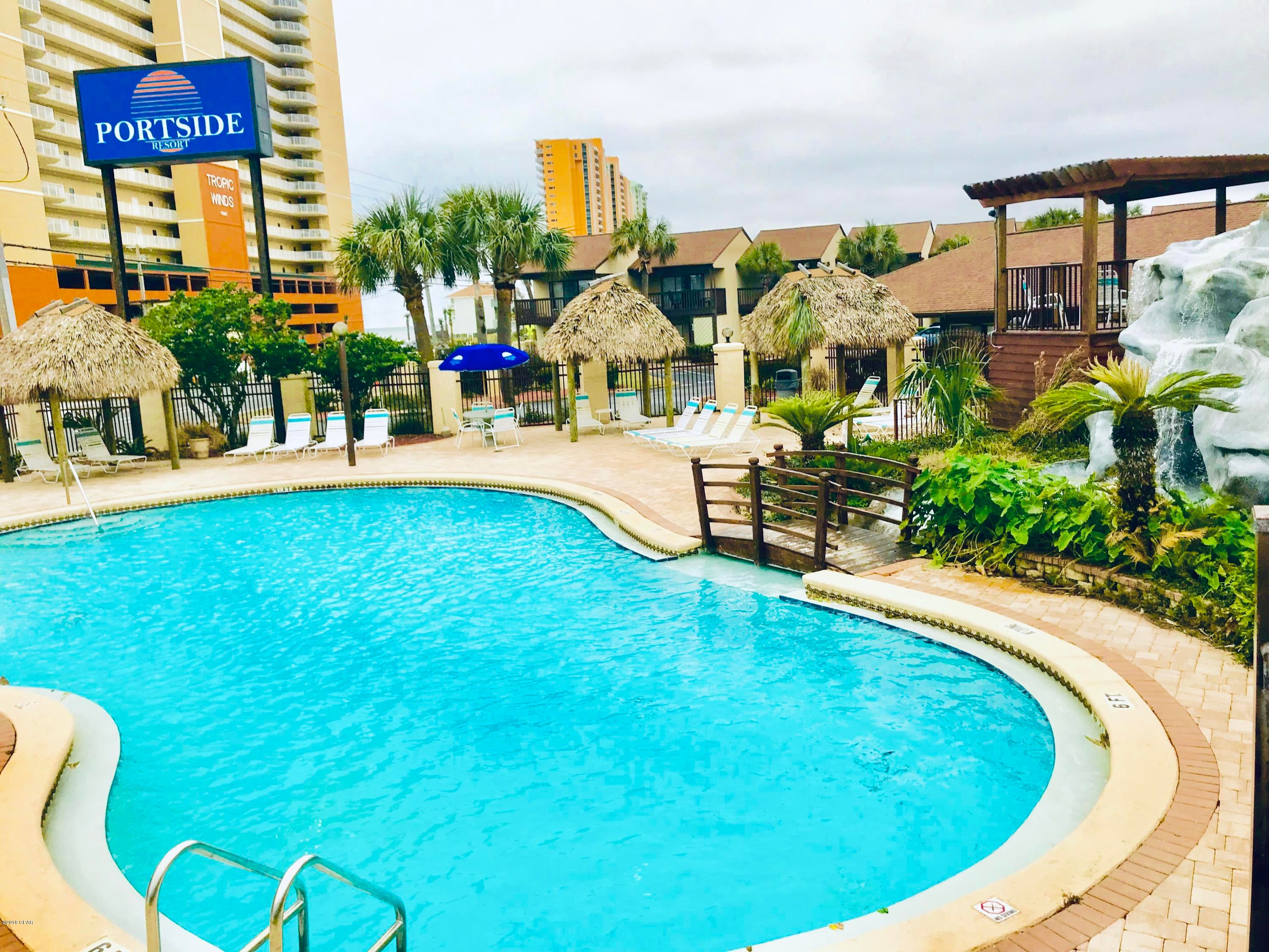 This gulf view condo is only a 2 minute walk to the beach.  Recently updated with crown molding in living room and master bedroom. Full size washer and dryer, Stainlesss refrigerator, New stove and microwave.   Tile floors throughout the main level as well as the full bath with shower downstairs. The master has a walk in tile shower with double, separate vanities. Dressing area between the master bed & bath has a walk in closet. Ceiling fans throughout. The resort offers 3 pools (one heated during winter months), 2 Jacuzzi's, 3 tennis courts, shuffle board and fitness room which is directly across from this unit. Watch the fireworks, sunsets, & beach activities from your deck.  And only minutes away from Pier Park.