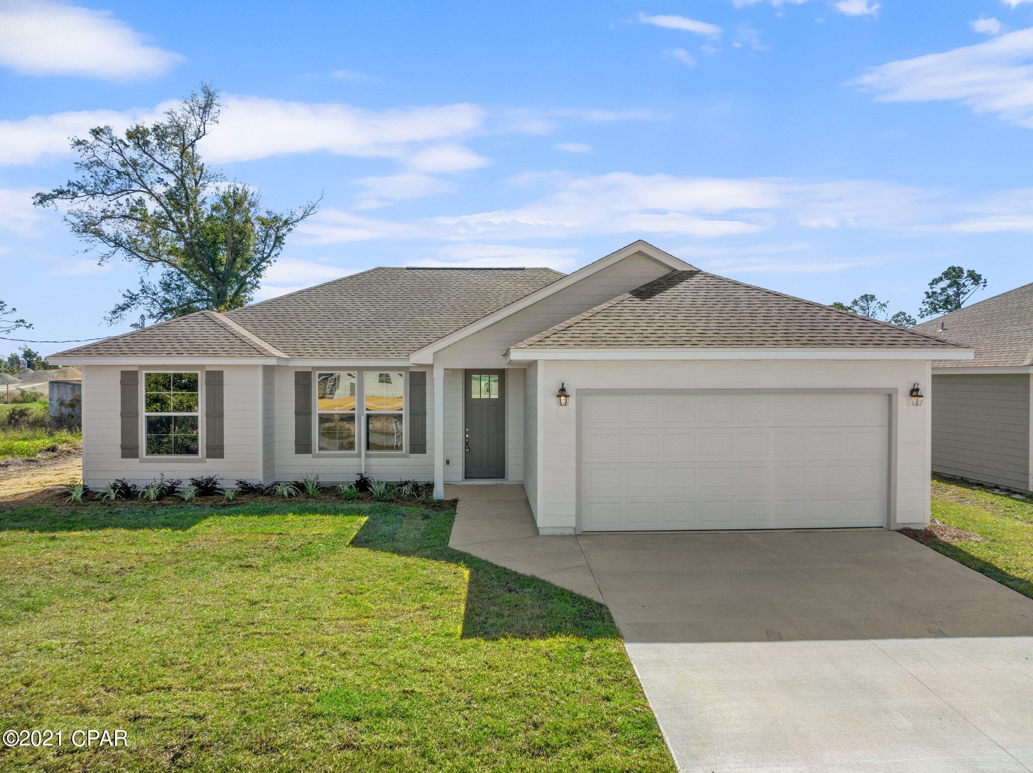 RARE opportunity to purchase a beautiful brand new construction home, in the middle of town, immediately surrounded by multiple new home sites, with NO HOA FEES! The view from the rear of the home overlooks an attractive pond, so no houses to be built behind! Nestled on a quiet street, this open floor plan home has been constructed using quality materials throughout, including granite counter tops, hardi-board siding, tiled master shower, LVP flooring throughout, enhanced insulation, stainless steel appliances, high quality shingles, along with professional landscaping(including irrigation), and to top it off this home comes with the peace of mind of a Builder's warranty. All sizes and measurements are approximate, verify if important.