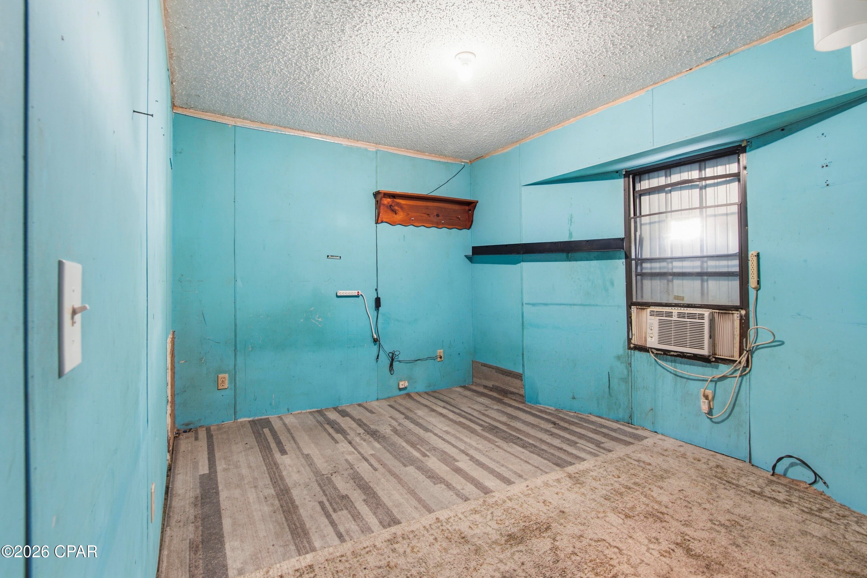 Nice opportunity in Laguna Beach. This fixer upper mobile home sits on a nice size lot, 50x110. Fix up the mobile home for  a rental investment or a nice beach getaway.  This home needs you!. Another option is to  remove the mobile home for a great building site. Laguna beach is a golf cart friendly area that welcomes short term rentals. It is a beach area on the west end of Panama City Beach with a laid back 'Beachy' vibe. It has its own 'Local's grocery store,'the Carousel',liquor store,gift shop, ice cream & Donut hangout called ThomasDonuts. This property is calling your name. Priced for land value,yet giving an opportunity to  put your sweat equity to work.