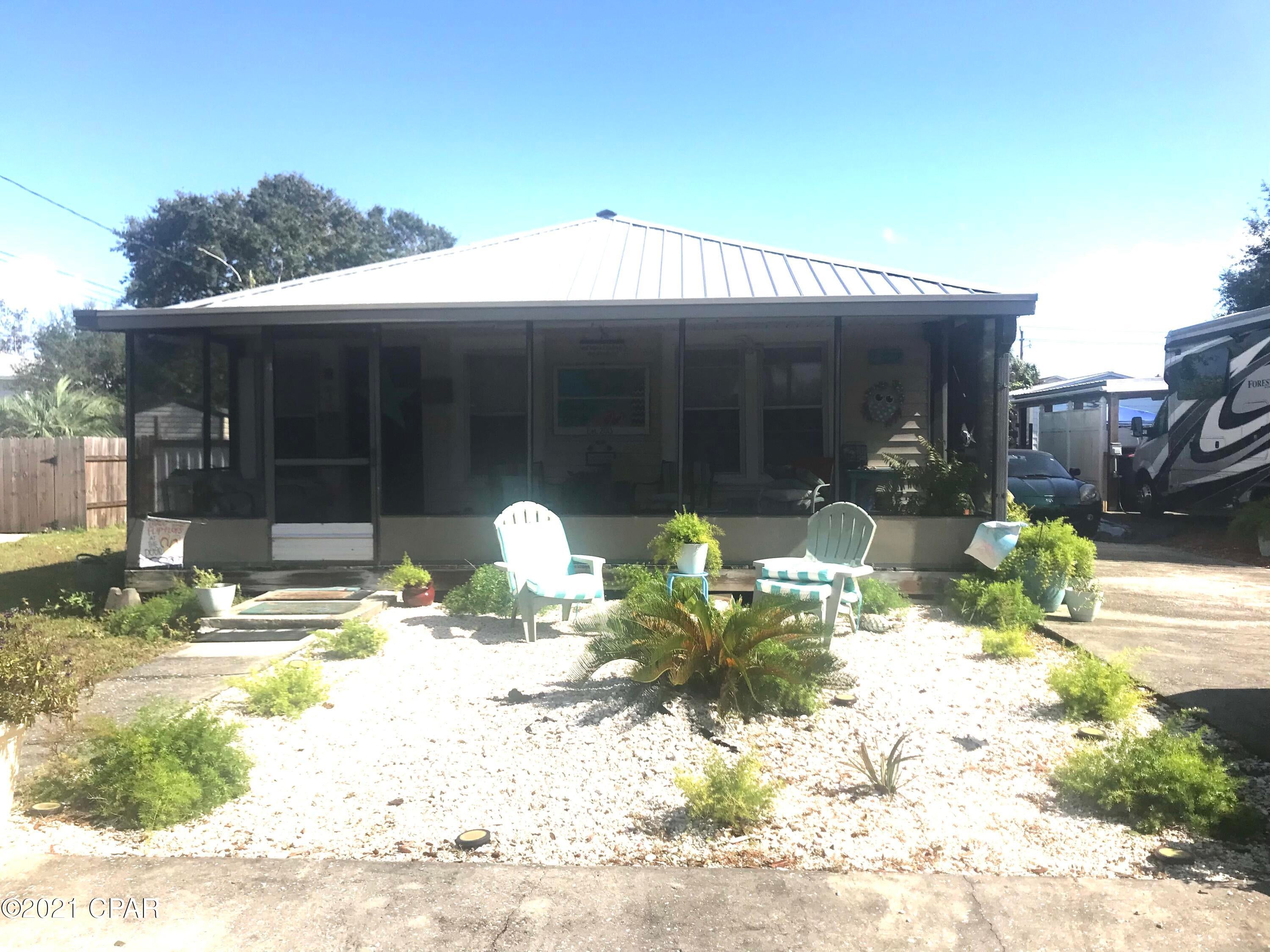 From the era of the 50's,the quaint little beach cottage has been a host of beach lovers for several generations.Walking through the front door will take you back in time. Located a block and a half from the fluffy white sands of the Gulf; walking distance or ride your golf cart. Three bedrooms/2 baths. Large lot 60 x 120. Screened front porch . No HOA. No Short Term Rentals.