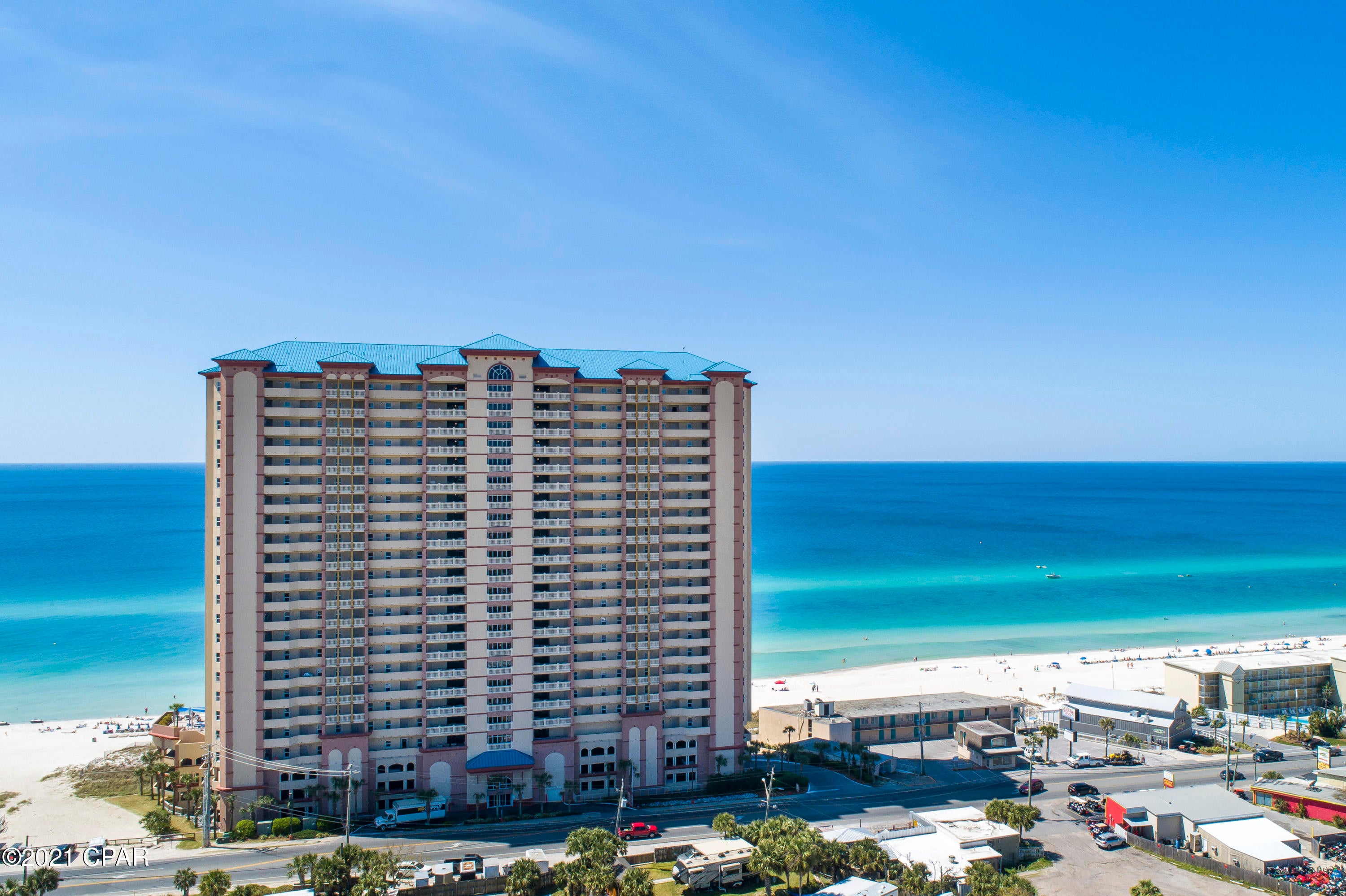 This beautiful Sunrise Beach condo comes furnished with 2 bedrooms 2 full baths and a separate bunk room. The spacious kitchen with granite counter tops opens up to the dining area and the gulf front living area. The master suite has a gulf front view from the bedroom and master bath includes dual sink vanity, large tub and separate shower. Improvements include recently painted walls and trim, LVP flooring in living room, new water heater & dishwasher. Full laundry room and extra-large balcony. Convenient parking directly below condos with easy access to elevators, two pools and spa, children's water play area, gulf front fitness area, and beach access. Perfect second vacation home or a turnkey vacation rental property. Sunrise Beach is a perfect location and close to Pier Park.