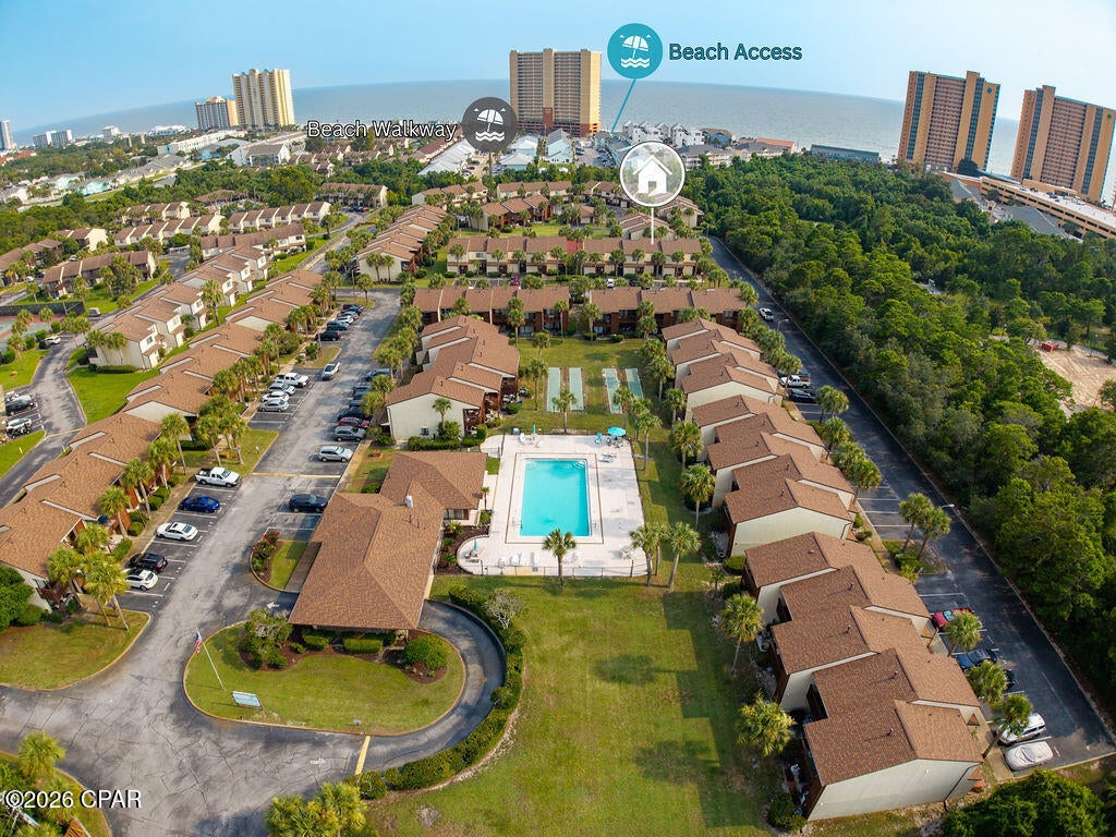 'CURRENTLY UNDER CONTRACT, SELLER WILL CONSIDER BACKUP OFFERS' If you've been waiting for the perfect beach condo that stands above the competition, your search ends here. Welcome to Beachwalk Condominium, one of Panama City Beach's hidden gems on the highly desirable west end. Connected to the Gulf by a private gated pedestrian bridge, you'll enjoy a leisurely 7-minute walk to the sugar-white sand and emerald waters.
Beautifully updated, impeccably maintained, and offered fully furnished, this move-in-ready 2-bedroom, 2-bath condo has never been a short-term rental. Instead, it has been a cherished family beach retreat, lovingly cared for and reflecting true pride of ownership. Best of all, short-term rentals are allowed, giving the next owner the flexibility to enjoy it as a personal getaway or a vacation rental investment.
Inside, you'll find a remodeled kitchen with custom cabinetry, elegant countertops, updated finishes, and an open layout perfect for entertaining. Thoughtful upgrades, including updated molding, custom drapery, and quality finishes throughout, add style and character. The two-story floor plan provides privacy, with the spacious primary suite featuring a private vanity area and covered balcony overlooking the peaceful green space and tennis courts.
Additional features include two exterior storage closets, assigned parking, and an upstairs laundry area.
Beachwalk offers a community pool, tennis courts, shuffleboard, clubhouse, dog-walking areas, low HOA fees, and private gated beach access. Conveniently located just minutes from Pier Park, Scenic Highway 30A, Frank Brown Park, shopping, dining, and entertainment, you'll enjoy the best of Panama City Beach while coming home to a peaceful beachside community.
Whether you're looking for a primary residence, vacation home, or income-producing rental, this exceptional property checks every box. Beautifully updated, fully furnished, lovingly maintained, and priced at just $239,000, this is a rare opportunity to own a beach home that's been enjoyed, not simply rented. Now it's ready for its next chapter--and yours.