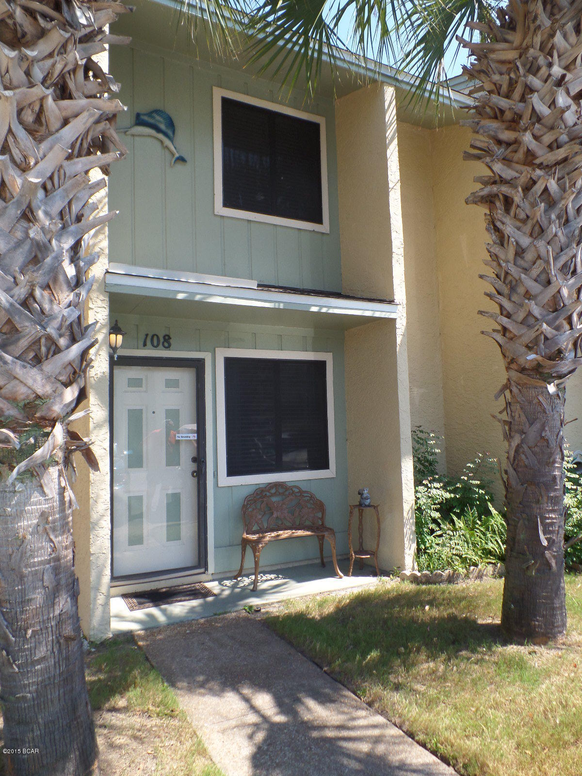 Charming townhome located across from one of 11 pools and several tennis courts. Fully furnished and ready to enjoy, this townhome features a balcony off the master bedroom and a covered patio; great for grilling and enjoying the Florida sunshine! New A/C and exterior paint in 2011. New roof, flooring, loveseat, sofa, blinds, 2012. New dishwasher & garbage disposal 2015. Centrally located to shopping, restaurants and the beautiful Gulf beaches. Gulf Highlands is a pet friendly resort and has 11 pools of which 5 are heated and one is located beachside with a café & clubhouse, 4 tennis courts of which two are lighted, community room with free wifi and 18 hole mini-golf. Gulf Highlands is a clean, well maintained community. A great second home and investment property!