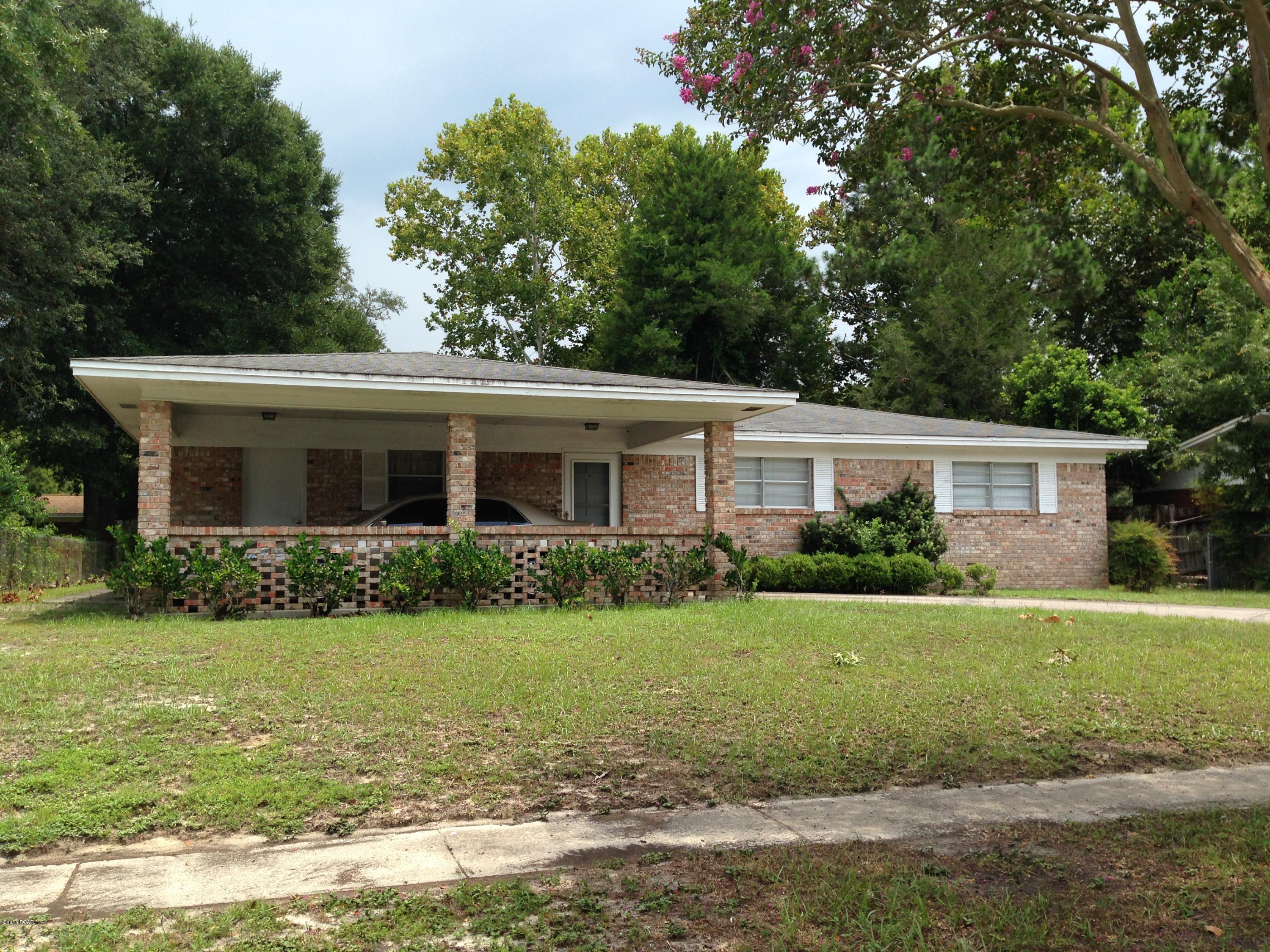 Brick  3 Bedroom 2 bath fully furnished Ranch Home conveniently located near Tyndall Air Force Base. Features include kitchen with a breakfast bar that is open to dining area and living room; laundry room that has room for plenty of storage; covered carport; and  large partially fenced back yard. Home is located in Lannie Rowe Estates a well established community with sidewalks located close to schools, restaurants, and shopping. All measurements are approximately. Please verify if important.