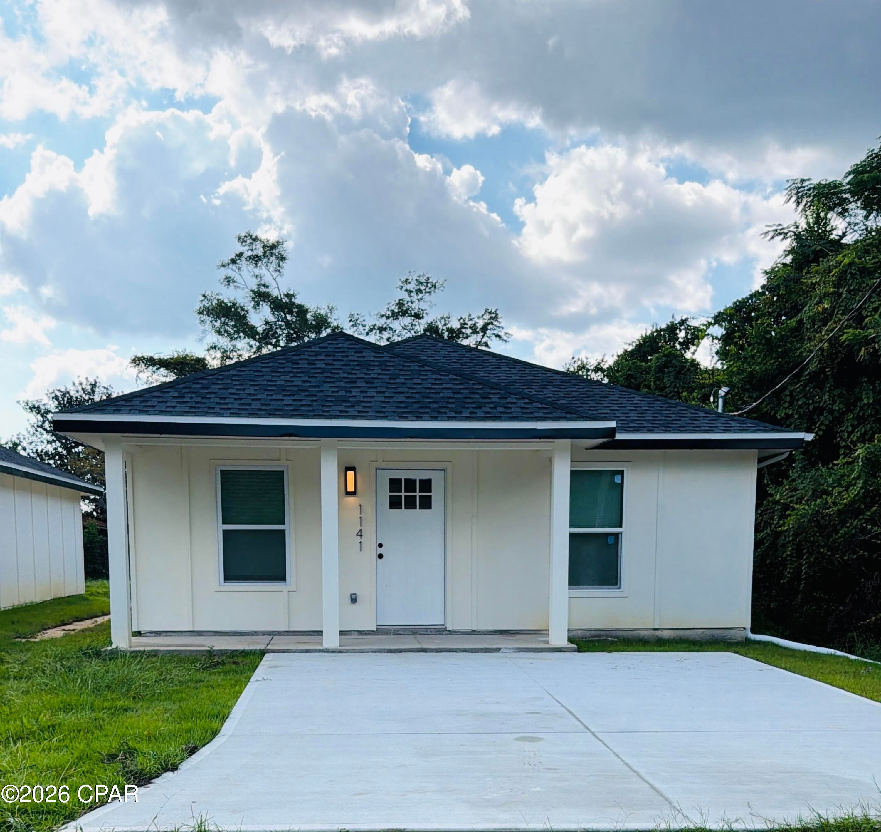 New construction at an Affordable  in the Panama CIty area. This is a 3 bedroom and 2 full baths with upgrades. Custom vinyl flooring throughout, stainless steel appliances, tankless water heater, and new washer and dryer included with the sale. The two bathrooms are fully custom upgraded. You have a large front porch. The back yard is large and plenty of room for kids to play. This is a perfect 1st time Homebuyer, Heroes, or Ship program where your down payment and closing cost is covered by Grants if you qualify. Don't miss this opportunity to buy this brand-new property. Located near hospitals, shops and excellent schools nearby Minutes from the beach and tourist areas. Make your appointment today.