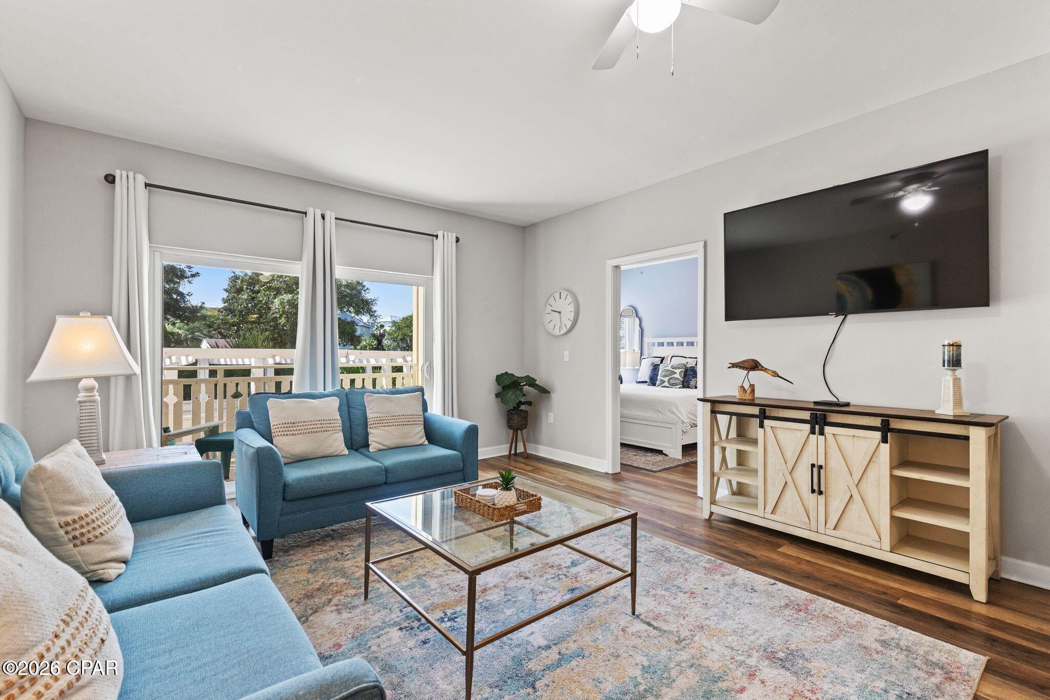 The ideal easy-to-own coastal retreat for a quick escape to laid-back Mexico Beach and the authentic Old Florida feel buyers and guests crave. Just bring your flip-flops and swimsuit--this clean, modern, turnkey-ready condo makes beach living wonderfully simple. Park directly in front of first-floor Unit 110, walk right to the door, and enjoy single-level convenience with no stairs, no elevator waits, and no navigating heights.

Completely remodeled in 2021, this refreshed 2-bedroom, 2-bath condo offers the polished feel of a newer coastal home. The bright, open-concept interior blends coastal-chic finishes, neutral tones, and an easy flow between the kitchen, dining, and living spaces. A fully equipped kitchen with crisp white cabinetry, modern appliances, and a breakfast bar makes entertaining or settling in after a beach day effortless.

Step onto the private covered balcony, enjoy the Gulf breeze, and listen to the soft rustle of the palms. Tucked away from pool activity, Unit 110 provides a peaceful, private setting for morning coffee, evening cocktails, or relaxing after a day on the sand.

Located in gated Waterside Village, owners and guests enjoy a resort-style pool, hot tub, grilling areas, scenic boardwalks, and space for day docking. Less than a five-minute walk to the beach, this low-maintenance retreat offers fantastic value as a personal getaway, a second home away from home, or a vacation-rental investment.
