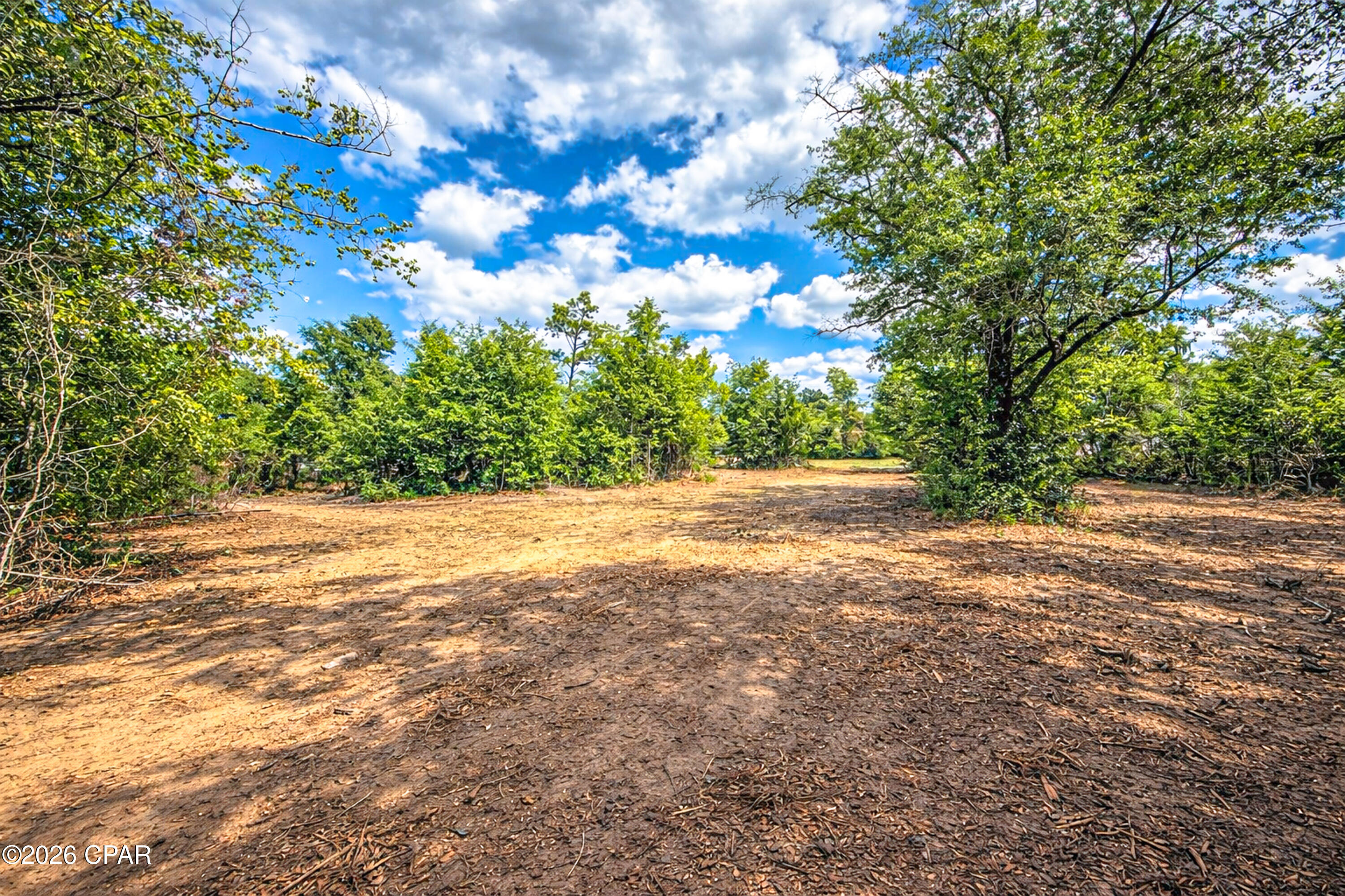 Very nice over 1 full acre lot located on a PAVED road just outside of Panama City.  The property is located convenient to everything Panama City has to offer, yet with the huge property gives ample space.  It is located in the rear of the subdivision which would have little drive by traffic.  The property possibly could be split into two 1/2-acre parcels.  Possible Owner Finance with 20% down at 8.5%, 25 years, payment of $383.29/month.  OR seller will do a 1-year Lease with Option to Purchase:  $1,500 down, $450/month, $100 of each payment to credit the purchase price.  All information is approximate and taken from the Public Records.  If anything is important to the buyer, please verify.