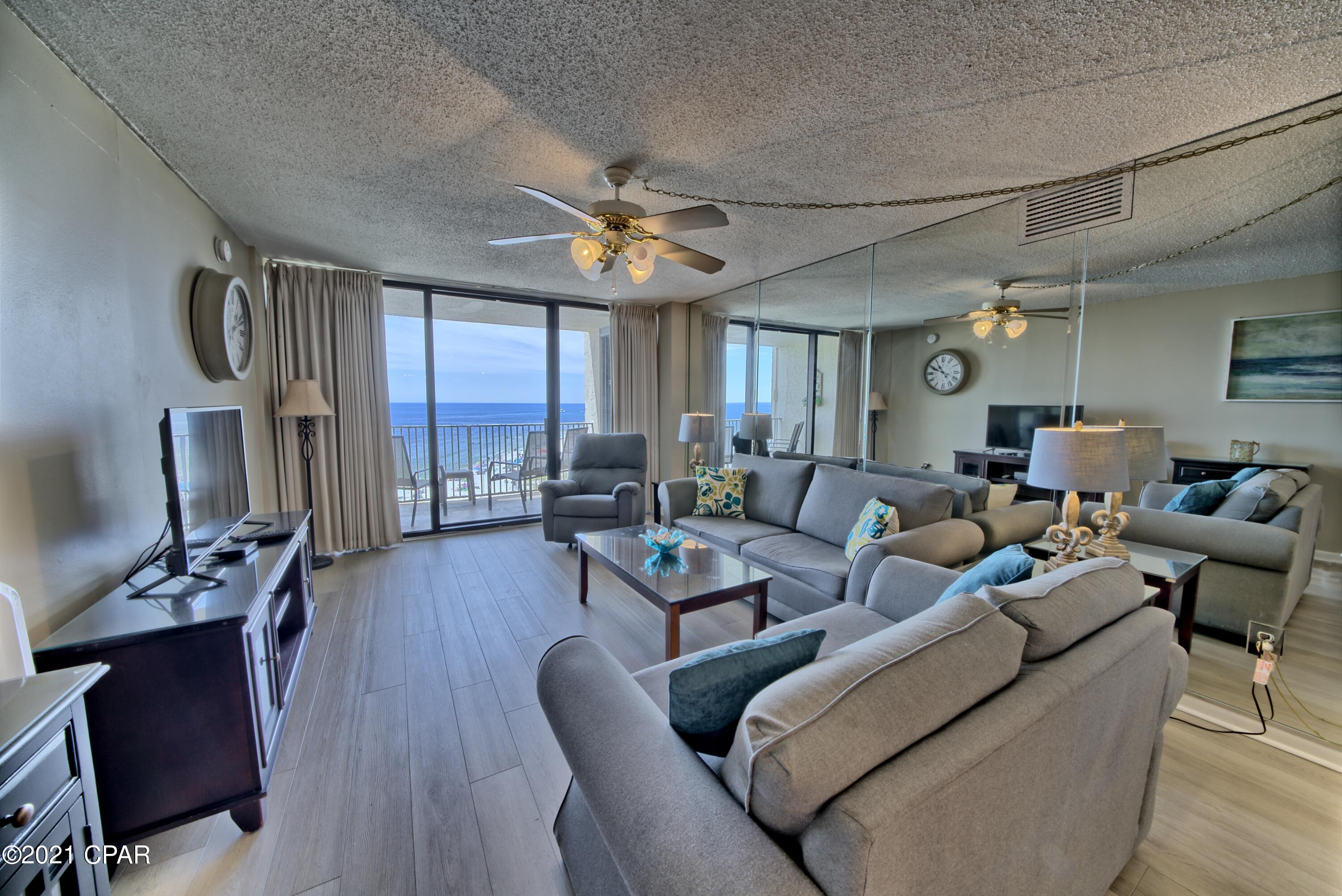 Amazing 2 bedroom/2 bath unit has been beautifully decorated and comes fully furnished! This unit is move in/rental ready. New Flooring,New Air, Stainless Steel appliances, New cabinets,New Granite, New furniture, New Bath vanities, Stackable washer & dryer. Gorgeous gulf front living room, private balcony, 2nd bedroom has 2 double beds. The master bedroom is gulf front and has a large window with great sunset views. Comes with a covered parking stall. Dunes of Panama amenities include...pools, dedicated beach, tennis courts and more! All info is believed to be correct, but should be verified by the buyer.