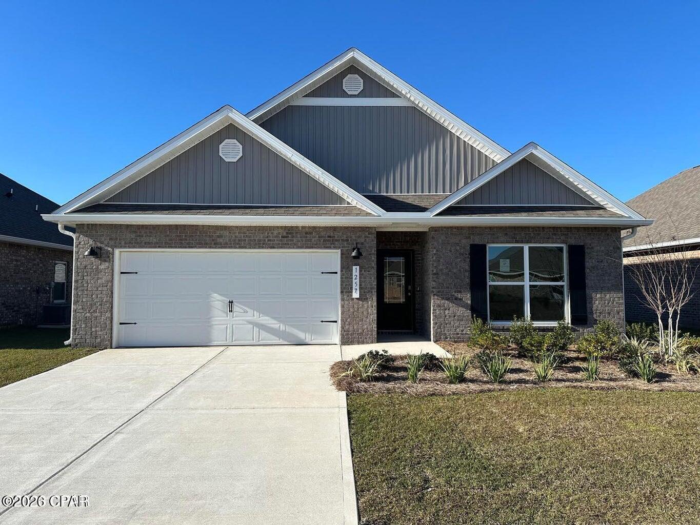Check out this beautifully maintained 4-bedroom, 2-bath brick home located in the desirable Andrews Plantation community in Lynn Haven. Inside, you'll find luxury vinyl plank flooring throughout the main living areas, with carpeting in the bedrooms for added comfort.

The open-concept kitchen and living area provides an inviting space for everyday living and entertaining. The kitchen features stainless steel appliances, granite countertops, a spacious walk-in pantry, recessed lighting, and plenty of workspace and storage. The adjoining living room is highlighted by an elegant double tray ceiling that adds character and dimension to the space.

The spacious primary suite features a tray ceiling and a private en-suite bath with dual vanities, a walk-in closet, separate shower, and relaxing soaking tub. The additional bedrooms are thoughtfully positioned off the foyer, providing separation and privacy from the primary suite.

Step outside to the covered back patio, ideal for relaxing, grilling, or entertaining family and friends.

 Conveniently located in the sought-after Lynn Haven area, this home offers easy access to shopping, dining, schools, parks, public boat launches, and other area amenities. With its attractive floor plan, desirable features, and convenient location, this home checks all the boxes.