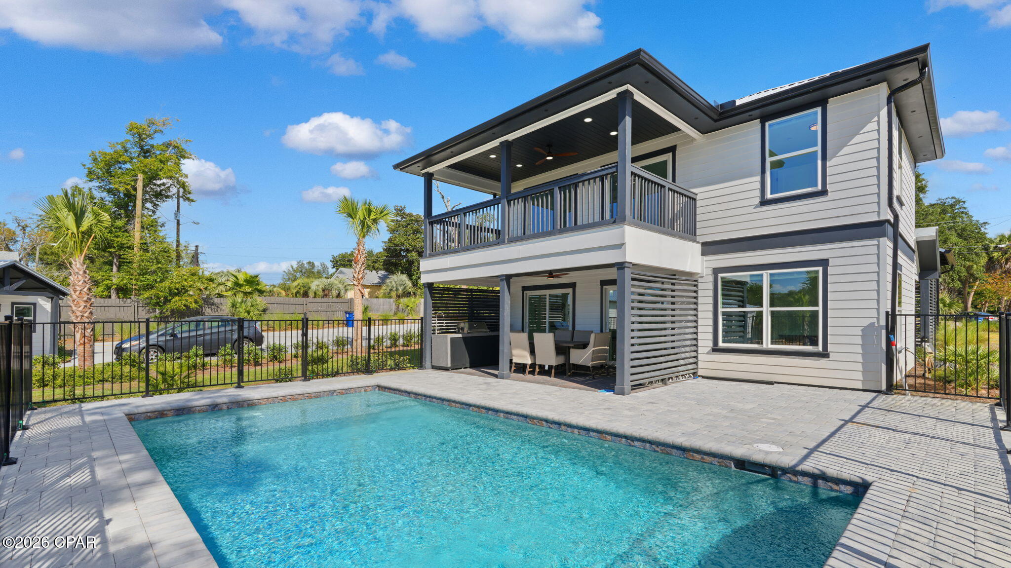 ATTENTION!! 
3 SEPARATE STRUCTURES, 2 SEPARATE PARCELS, 1 AWESOME PRICE!!  Zoned for short term and long term rental.
Waterfront on Massalina Bayou! 
Main House:  Amazing 3-bedroom 2-bath with den/office *new construction*. Gorgeous views from covered porches on both floors. First floor has open kitchen with Forno Italian stainless appliances, large Island, gas stove, double door refrigerator w/ice maker and wine cooler. Living/dining walk out large sliding doors to covered porch, outdoor Thor stainless summer kitchen and pool/bayou views. Master bedroom and master bath with large custom shower, double vanity sink and walk in closet. Second floor open family room, den/office, large sliding doors to walk to walk out to covered porch overlooking pool/bayou. Two additional bedrooms and one bath. So much to offer with beautifully designed tile flooring throughout, tankless water heater and extra storage. 
401 Massalina Drive is under a lease for 5 months with potential for 2 month extension. $3600 per month and includes utilities and pool service. 
405 Massalina Drive:
Carriage House plus Quadplex/Fourplex:
$7100 per month or $85,200 per year in rental income from the carriage house and quadplex/fourplex. Perfect for a DSCR loan where your rental income pays for your mortgage, plus you get a dock and a place to park your boat on deep water.  This is the most versatile quadplex/fourplex plus carriage house (comes fully furnished) in Panama City. Here is the rental income breakdown: Carriage house = $1750 per month; Apartment 1 (Civil Contractor) = $1450 per month; Apartment 2 (Realtor) = $1450 per month; Apartment 3 (Property Maintenance Man) = $1,000 per month (reduced because he takes care of the lawn and pool - you could charge $1450); Apartment 4 (Josh) = $1450 per month; Total income = $7100 per month or $85,200 per year.

New custom landscaping and pool to relax and enjoy. Beautiful decking, shared dock with fish cleaning station. Location is easy to access to newly renovated downtown entertainment with shopping, dining, concerts and ongoing festivities.