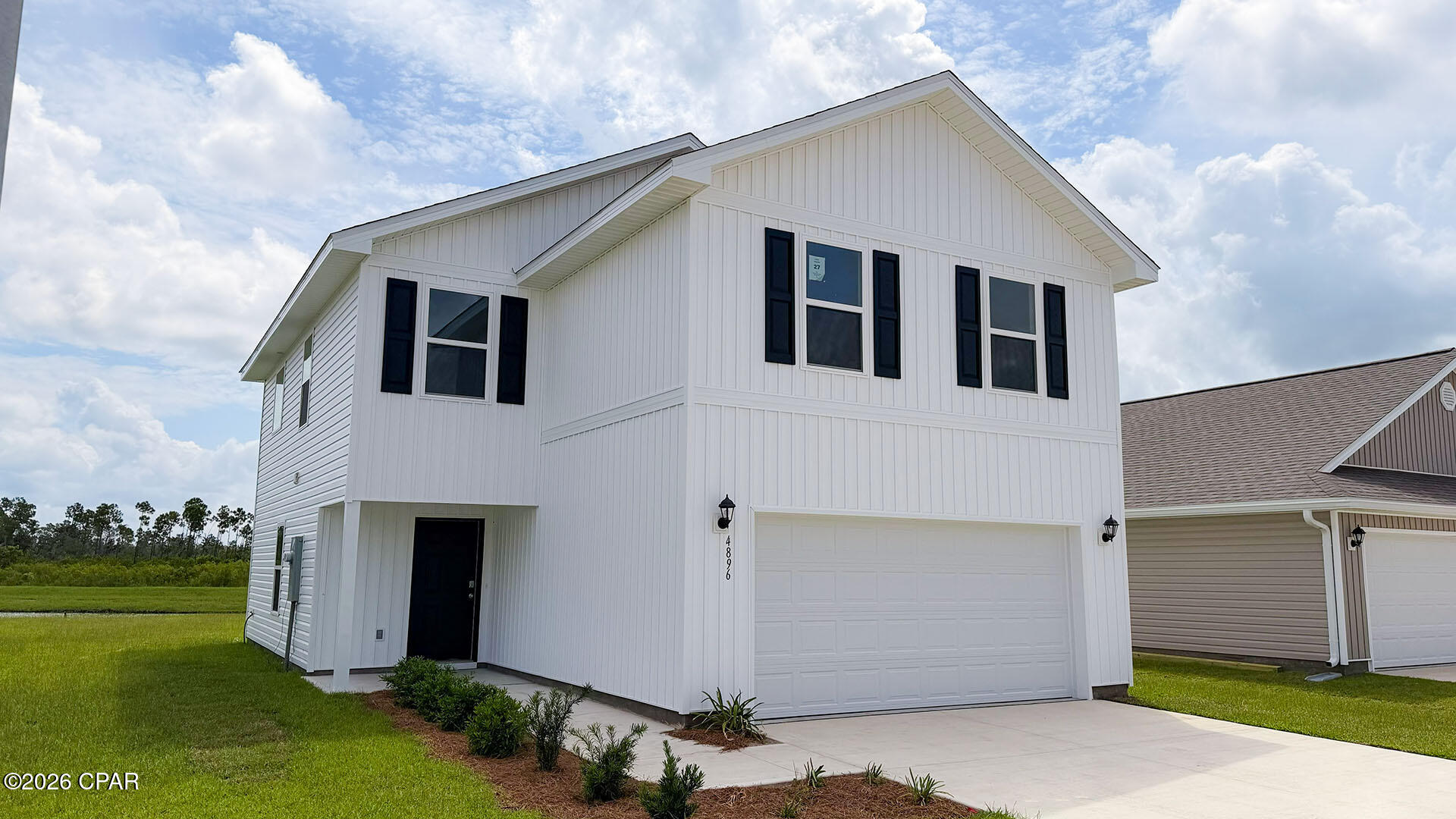 Welcome to the Aisle, a new home floor plan at Titus Park in Panama City, Florida. The Aisle is our only two-story floor plan available currently at Titus Park, featuring a spacious open kitchen and living room design on the bottom floor, and a thoughtfully laid out upstairs that feels large and cozy. The Aisle floor plan is a spacious 4-bedroom, 2.5 bathroom, with 1,960 square feet and includes a two-car garage. On the outside you will notice vinyl siding and a concrete walkway to the front door, which is covered by the second level. On the rear of the home, there are two backdoors covered by an awning with a concrete pad with room to sit on your back patio and enjoy the beautiful sunsets of Panama City.

As you enter this home, you will think of endless possibilities for laying out your home with an open kitchen, living room, and dining area all in one that encompasses the entire first story of the home. The two-car garage leads right into the other side of the kitchen and dining area to the back door.

In the upstairs bathrooms and kitchen, you will see beautiful granite countertops with undermount sinks, EVP flooring throughout the main areas, and soft, comfortable carpet in the bedrooms and stairs. Stainless-steel appliances including a dishwasher, microwave, and stove are included in these homes, as well as a Smart Home technology like all homes in Titus Park.

Our Titus Park community features underground utilities making it less susceptible to damage from severe weather leading to fewer outages and more reliable service. Residents of Titus Park can enjoy exclusive access to the newly built amenity center with a pool, BBQ pits and lounge chairs!

To learn more about this home and the other beautiful homes at Titus Park, stop by our model home or schedule a tour with us today, you won't be disappointed!