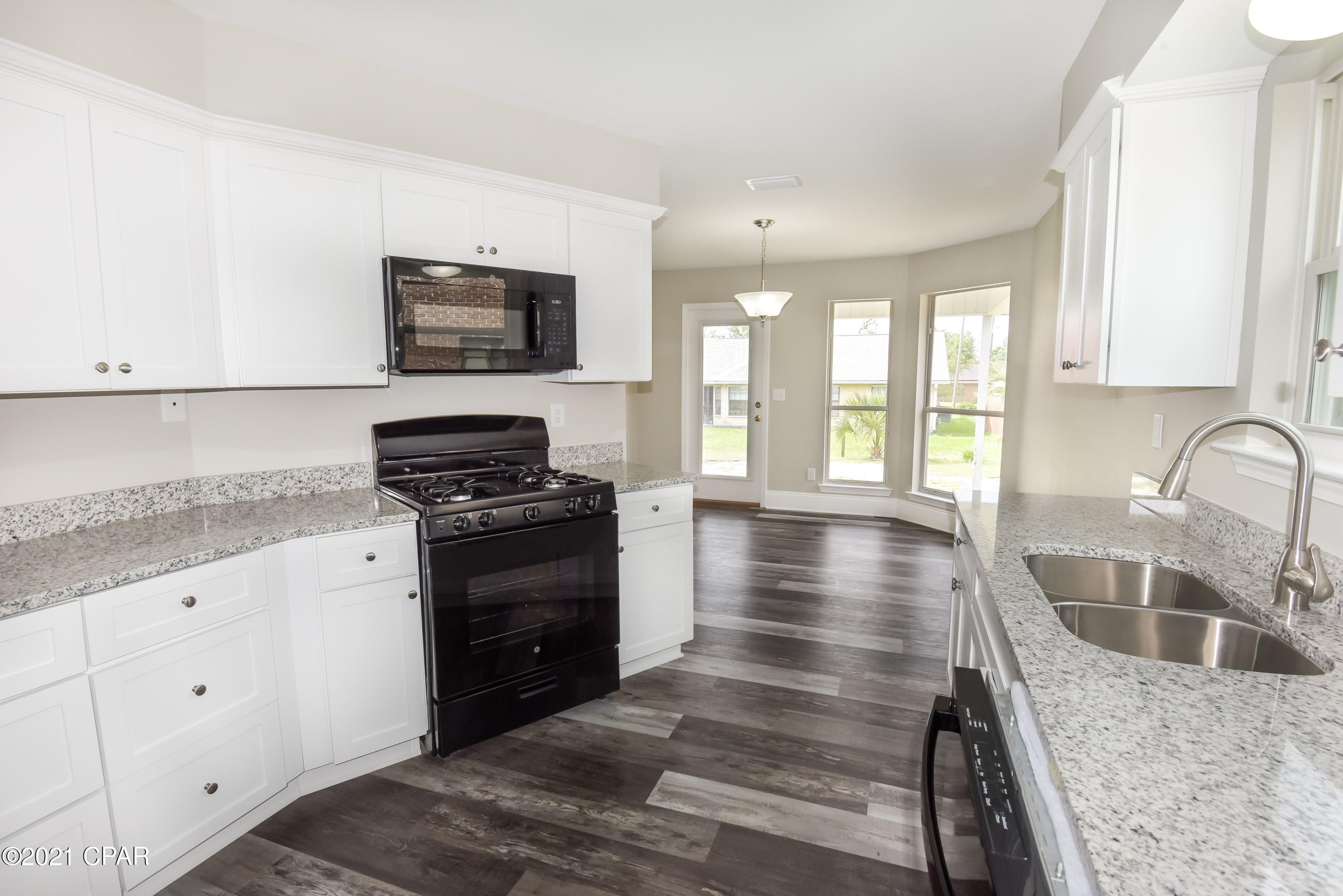 CURRENTLY UNDER CONTRACT, SELLER ACCEPTING BACKUP OFFERS. Welcome to this beautiful, completely renovated home in the desirable subdivision of Shadow Bay. This 3 bedroom, 2 bath has luxury vinyl plank flooring throughout the entire home. Dining area has bay windows that overlook the backyard. The kitchen and bathrooms are complete with granite countertops. Master bedroom includes ensuite bathroom and bay windows. Nice large backyard, great for entertaining and plenty of space for a pool and family fun. All info and measurements are approximate and must be verified by the buyer.