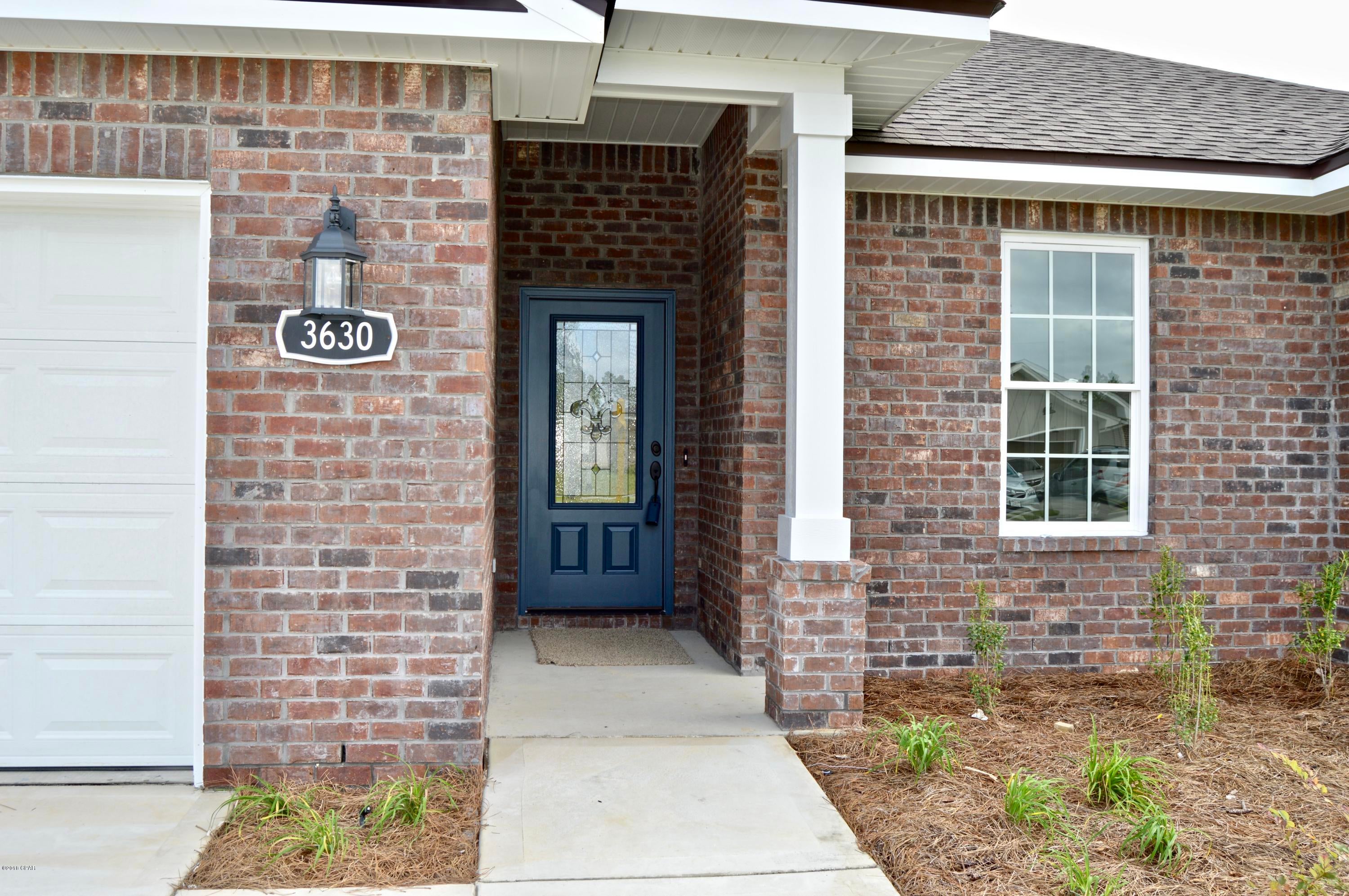 NEW CONSTRUCTION 4/2 in recently opened Cedar Park offering easy access to greater Panama City, Panama City Beach and TAFB! All brick home offers Great Room with raised ceilings, dining room, kitchen with island, granite counters, and stainless appliances, master suite with tray ceiling,double vanity, separate shower and tub, walk-in closet. Other interior features include tile flooring, recessed lighting, custom cabinetry, distinctive lighting fixtures and upgraded ceiling fans.Exterior includes all brick siding, 2 car garage, covered porch, and sprinkler system. Cedar Park features landscaped entrance, central park area, pavilion, underground utilities, custom street lighting and sidewalks. All sizes, dimensions and other info should be verified if deemed important