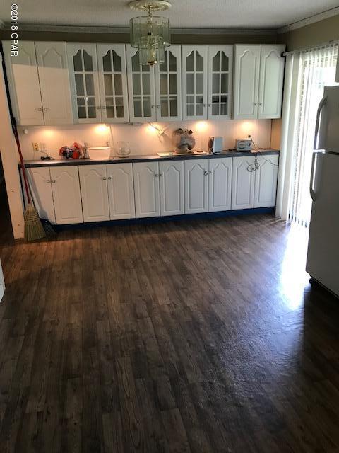 3 bedroom 1 1/2 bath brick home with a pond in the back yard.  New roof, new AC unit and new floor covering.