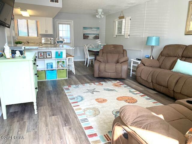'CURRENTLY UNDER CONTRACT, SELLER ACCEPTING BACKUP OFFERS' Grab your Realtor and come L@@K at Me. I'm a very ''Coastal Looking'' unit with 2 Bedrooms and 2.5 Baths backing up to the Tennis Courts, Pool, and Playground in Gulf Highlands Beach Resort. From this unit it is a very Short Stroll to The Beach. If you like the Outdoors, you will love Entertaining on this Extended Patio while watching a game of Tennis. The Dues are $700/Qtr, these are Townhomes in a Home Owners Association NOT Condos, you own your front yard and back yard and 2 Parking Spaces. Amenities... 11 Pools, 4 Tennis Courts, Shuffleboard Courts, Play Ground, Conference Center, 18 Hole Mini Golf, and a GULF FRONT BEACH HOUSE with a Snack Bar and BEACH FRONT POOL... All this in a Gated Resort! Dimensions and Sizes are Approx