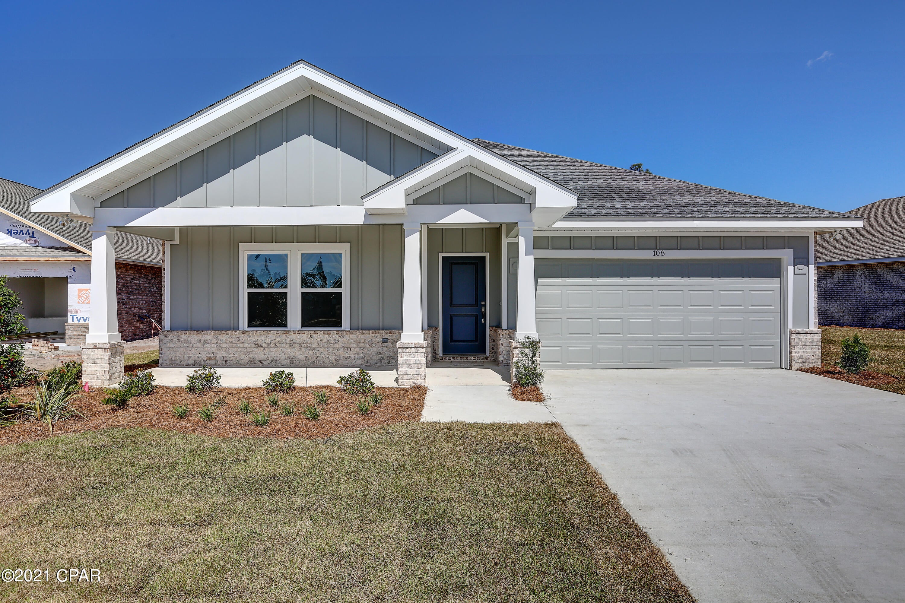 NEW CONSTRUCTION, CAMRYN'S CROSSING II subdivision in Lynn Haven, built by Southern Coastal Homes. INTERIOR features of this coastal inspired home offer a private Foyer entrance that leads to a large Great Room with tray ceiling.  Kitchen with center island, custom cabinetry, & stainless steel appliances leads into dining area & is open to the great room. Master Suite has tray ceiling, double vanity, garden tub, & walk-in closet.  Spacious covered patio just off Great Room makes this home perfect for entertaining.  Cam II offers walking park and playground.

EXTERIOR-This ALL BRICK home features a 2 car garage, covered porches, fully sodded yard with Rain Bird sprinkler system. 

BUYER TO PAY DOC STAMPS ON DEED.

Photos not of actual house but one with same floor plan.