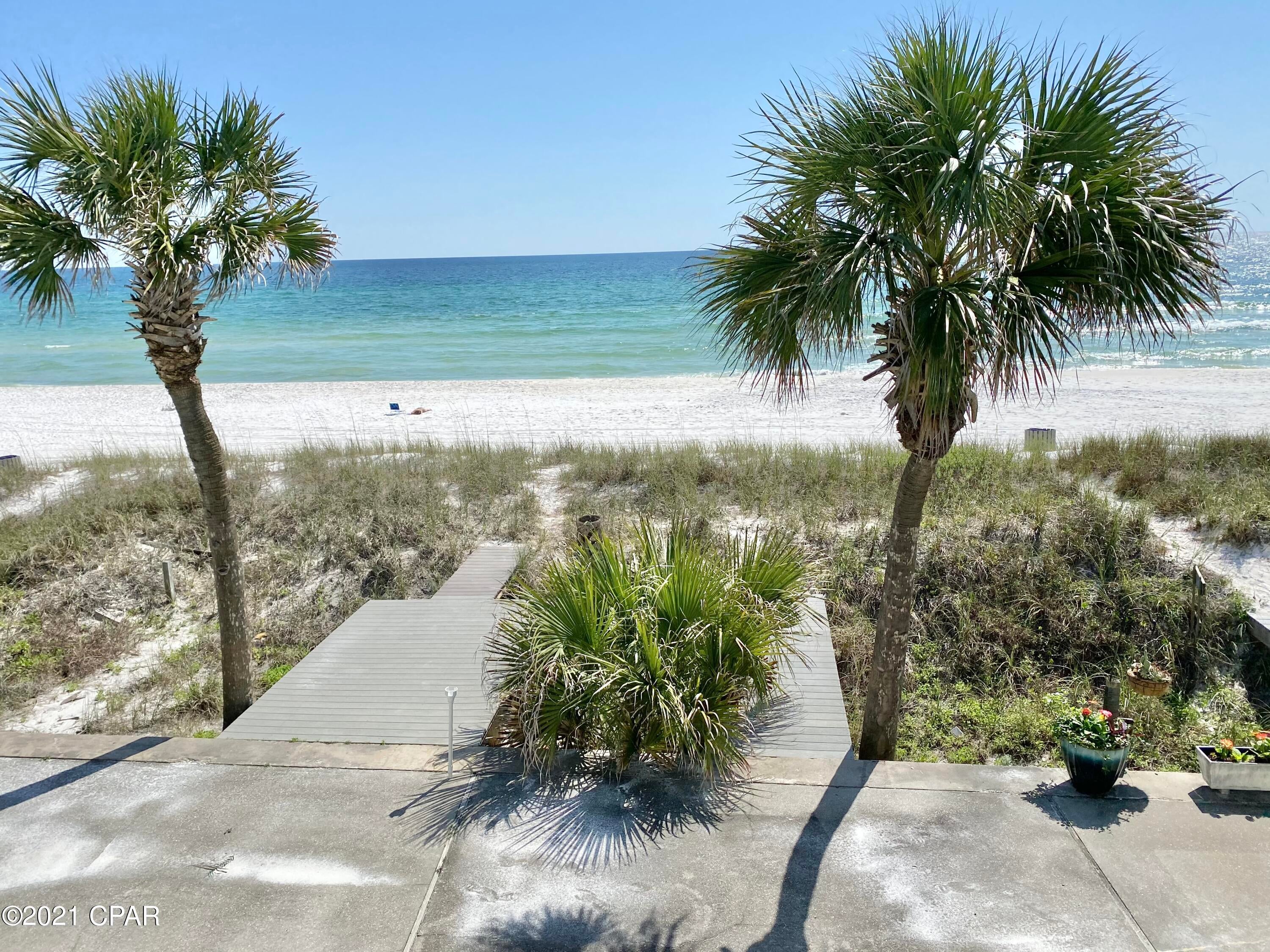CURRENTLY UNDER CONTRACT, SELLER ACCEPTING BACKUP OFFERS

Gulf Front Townhome-Enjoy NO HOA assessments & No Short Term Rentals! 

Estate is settled and seller's are ready for offers 

2 spacious Bedrooms, one Gulf Front-Incredible opportunity to own your piece of paradise in Panama City Beach, Florida. Just off of Thomas Drive on the East end of Panama City Beach. The 1st level features Gulf Front living Room, kitchen with granite countertops, laundry and a full bathroom. The second floor features two large bedrooms each with en-suite bathrooms. The master bedroom is beach front offering gorgeous views from your private balcony. From the first floor living space you can walk directly out to a large patio area and it is only a few steps down to the beach.