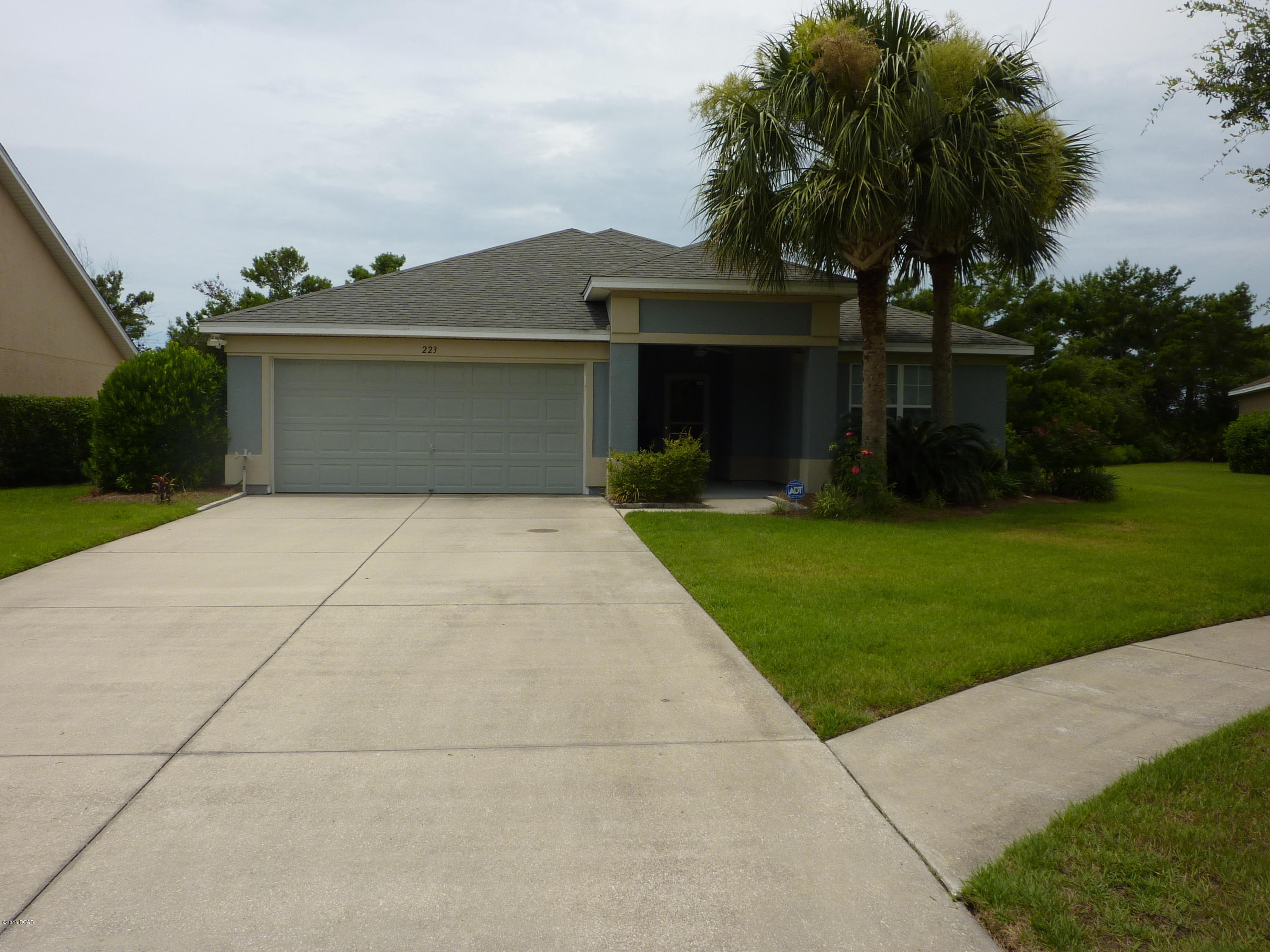 Just Reduced $10K!!  Well maintained home 3 bedroom 2 bath in Palmetto Trace. Walk to Pier Park!! Laminate wood flooring throughout main living areas with tile in kitchen and bathrooms.  Home features spacious fenced back yard and lovely landscaping.  Front and back covered patio/porch and even an outdoor shower to wash the sand off from the beach.  Located close to Pier Park/Frank Brown Park North of hwy 98 and just a mile from area beaches. Room sizes are approximate.  If important please verify.