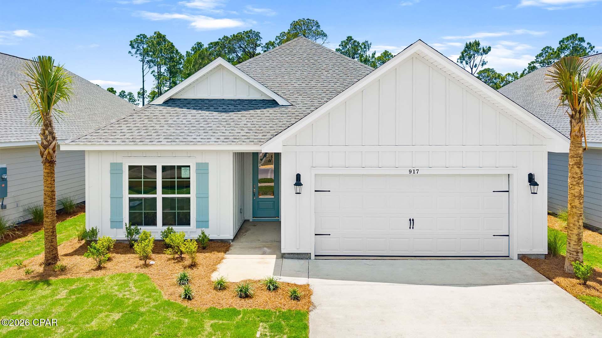 Welcome to 1019 Crystal Bayou Boulevard, a new home at Breakfast Point East in Panama City Beach Florida. Situated on an exterior lot with pond view at the back, this home is under construction and features 2,300 square feet of naturally lit open living space.  As you enter this home you will find a foyer with EVP flooring leading you past the first of three guest bedrooms and the guest bathroom. 

Continuing to the heart of the home, a large open concept living area awaits filled with natural light from the many windows and high ceilings. With modern finishes, the kitchen has a center island and is open to the dining and living areas. Elegantly appointed, it is designed with quartz countertops, Herringbone tile backsplash, EVP flooring, and a single basin undermount sink in the island. Just off the kitchen, you'll find a secluded hall leading to the primary bedroom. An exceptional feature of this home includes a gas cooktop stove. 

Located in a private area of the home, this bedroom offers high ceilings and large windows. The luxurious primary bath is complete with an oversize tile shower, a dual sink vanity with quartz countertops, and a large walk-in closet with shelving. The laundry room is also conveniently located at the other end of the hallway. All three guest bedrooms can be found on the other side of the home along with the two full guest bathrooms.