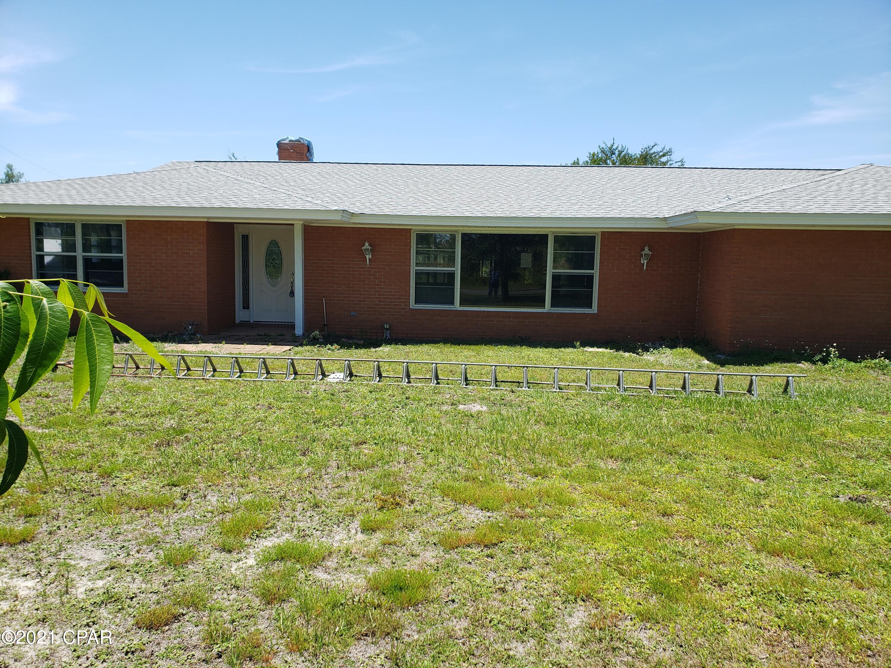 CURRENTLY UNDER CONTRACT, SELLER ACCEPTING BACKUP OFFERS. Rare find in this3 bedroom, 3 bath all brick home on 1.9 acres bayou waterfront with a pond this close in to town. Workshop and 29x10'10'' patio. 

Home has new roof, hurricane clips added, all water lines have been rerouted overhead thru manabloc system, new water heater.  Gutted and ready for you to make it your own.  Partial of garage had been closed in(already had bath)(included in H&C sq. footage) but at this stage could be reclaimed as garage.  Selling ''as-is''.
