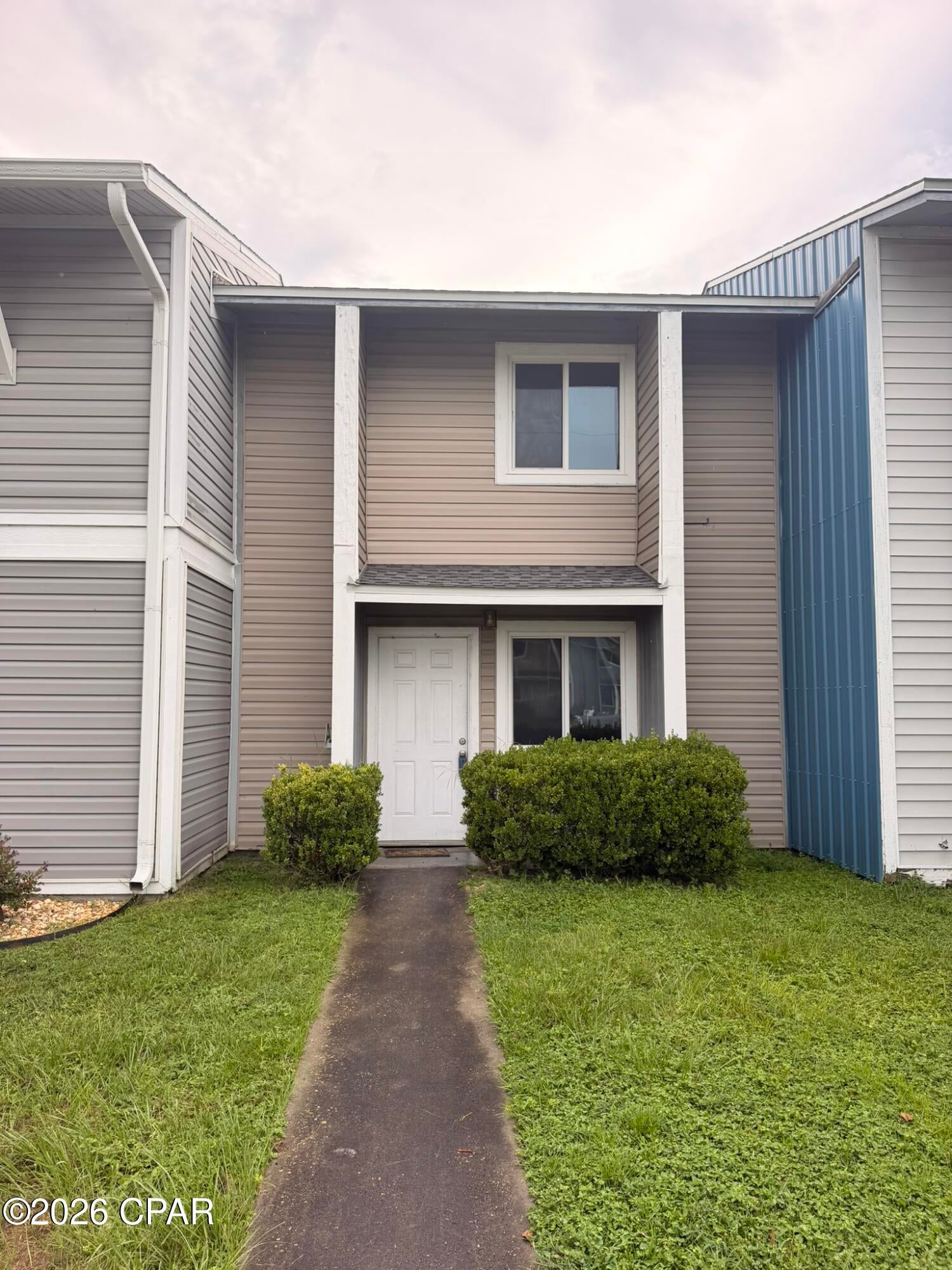 Centrally located 2-bedroom, 1.5-bath townhome that is move-in ready and ideal for a first-time homebuyer or investor looking for an income-producing property. The home has been updated and offers low-maintenance living.

The main level features an open living area with a convenient half bath. The kitchen is well maintained and equipped with an electric stove, dishwasher, microwave, and refrigerator. It overlooks the fenced backyard, providing added privacy and outdoor space.

Just off the back porch is the laundry room with washer and dryer hookups. Upstairs, you'll find two generously sized bedrooms with LVP flooring and a shared full bathroom.