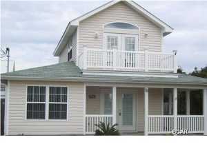 This is a nice 3 bedroom 2 1/2 bath 2 story home that is only a block from the Gulf of Mexico. This home offers a fenced back yard with an open deck a wrap around porch and a storage building in the back. 1 small pet 10-15 pounds allowed with approval and $250 pet deposit.