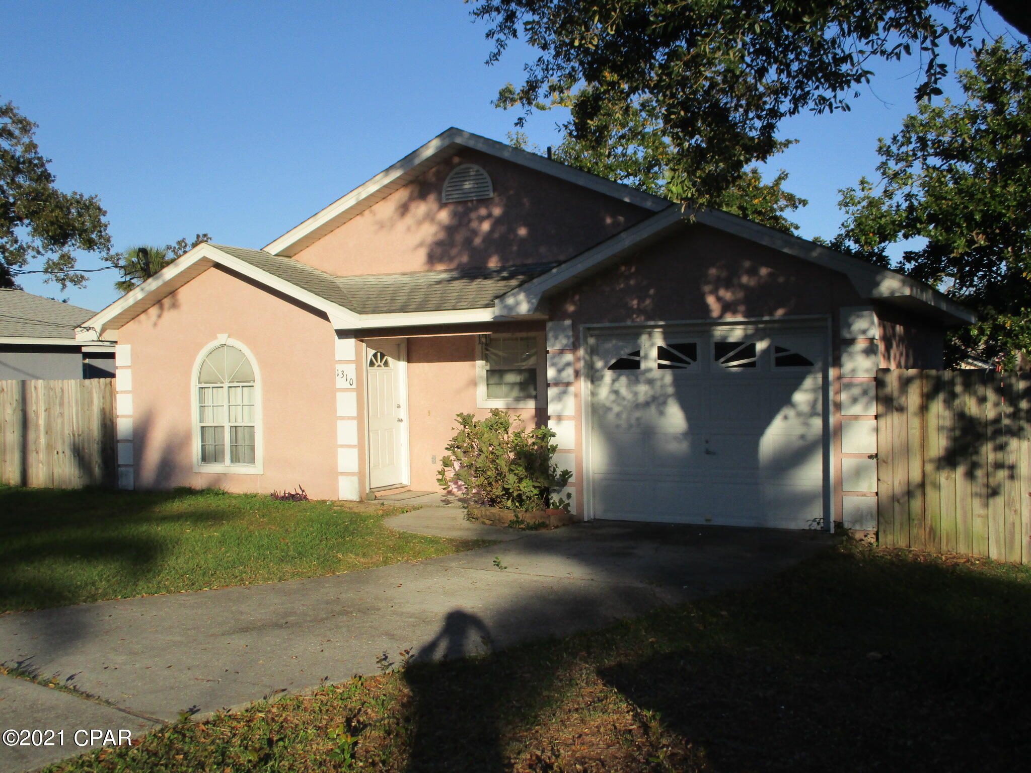 Lovely 3br/2ba 1,364sqft home located in desirable St. Andrews! The front door of this cute and clean Florida bungalow home opens up into a raised ceiling living room, and then to a lovely kitchen area, which is also conveniently accessible from the garage. Home has tile and vinyl plank flooring throughout, so is cool and easy to maintain. In the back is a bonus room with lots of windows and natural light, and out the back door is a large privacy fenced back yard with deck for barbecue's and entertaining, and a well maintained above ground pool for cooling off in the summertime! This home is just a short 3 block walk to the vibrant village of St. Andrews, with all of its restaurants and shops, and to beautiful St Andrews Bay.