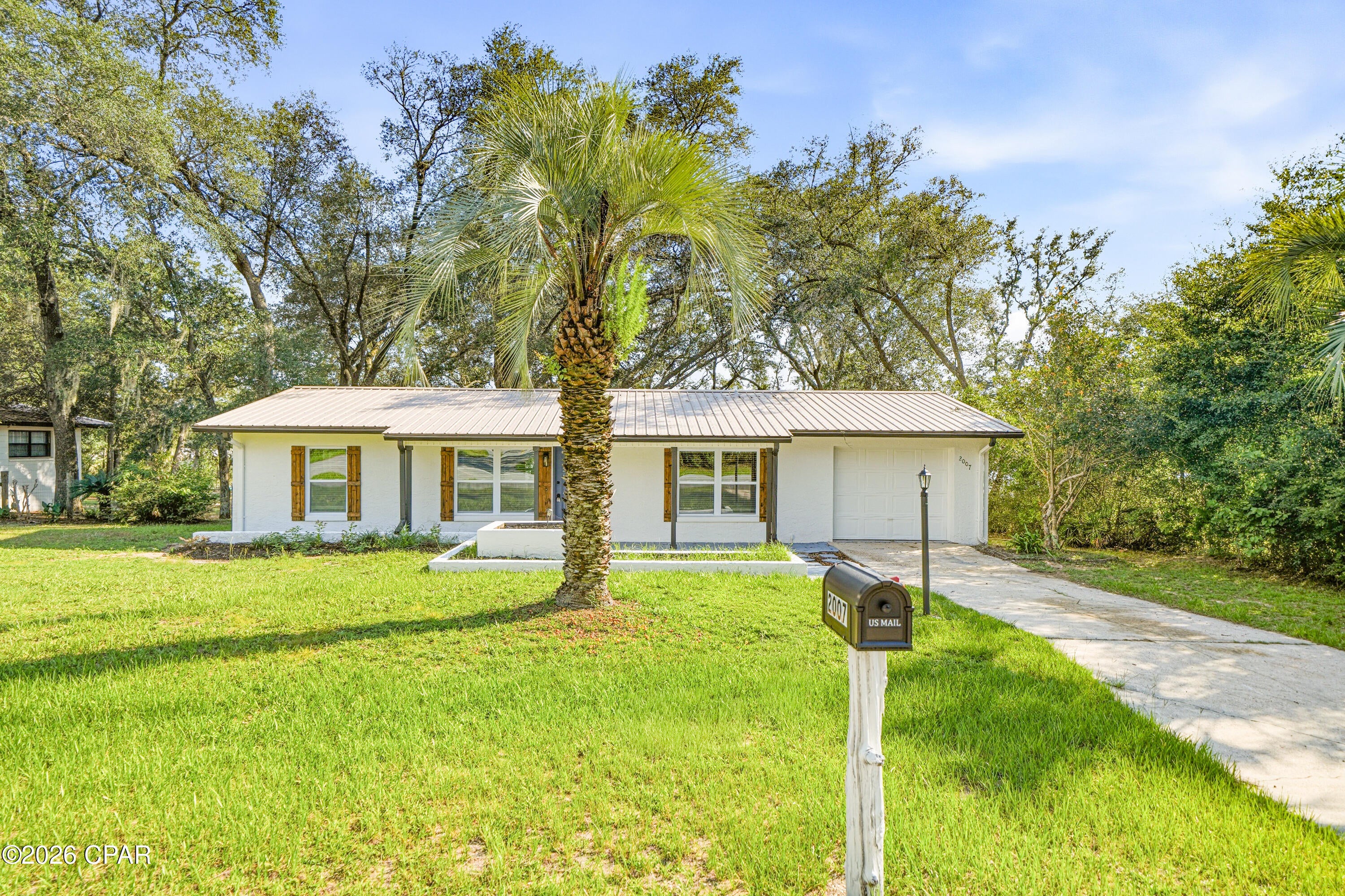 100% UPDATED HOME - BOAT LAKE FRONTAGE - SUNNY HILLS
100% Updated home on Leisure Lake! Brand-new kitchen with granite backsplash and stainless-steel appliances, updated bathrooms, new lights and fans, new textured ceilings, newer windows, new flooring, and fresh paint inside and out. Plus a 2018 AC, 2026 mini-split in the family room, and a metal roof for long-term durability.

Fantastic deal on Boat Lake in the Sunny Hills community -- a rare chance to own direct lake frontage with unobstructed views of one of the Panhandle's most beautiful spring-fed lakes. This 2/2, 1,333 sq ft handyman special sits on a premium lakefront lot with endless potential.

Wake up every morning to a BEAUTIFUL VIEW OF BOAT LAKE, known for its white-sand shoreline, crystal-clear water, and natural sandy bottom. Step right into fishing, swimming, kayaking, and enjoying Florida's natural beauty from your own backyard.

Waterfront Features
Waterfront Type: Lakefront

Waterfront Feature: Natural Shoreline

Waterview: Lake - Unobstructed

About Boat Lake
Boat Lake is the #1 attraction in Sunny Hills -- a 44-acre, spring-fed lake featuring:

White-sand beach

Clear-water swimming area

Picnic areas

Seasonal community events

Family-friendly swim park

4.6 stars (88 reviews)

Loved for its clean water and peaceful setting

Community Highlights
Sunny Hills offers:

Low taxes

No mandatory HOA

Quiet streets and natural surroundings

Easy access to Hwy 77, I-10, and Panama City / Panama City Beach