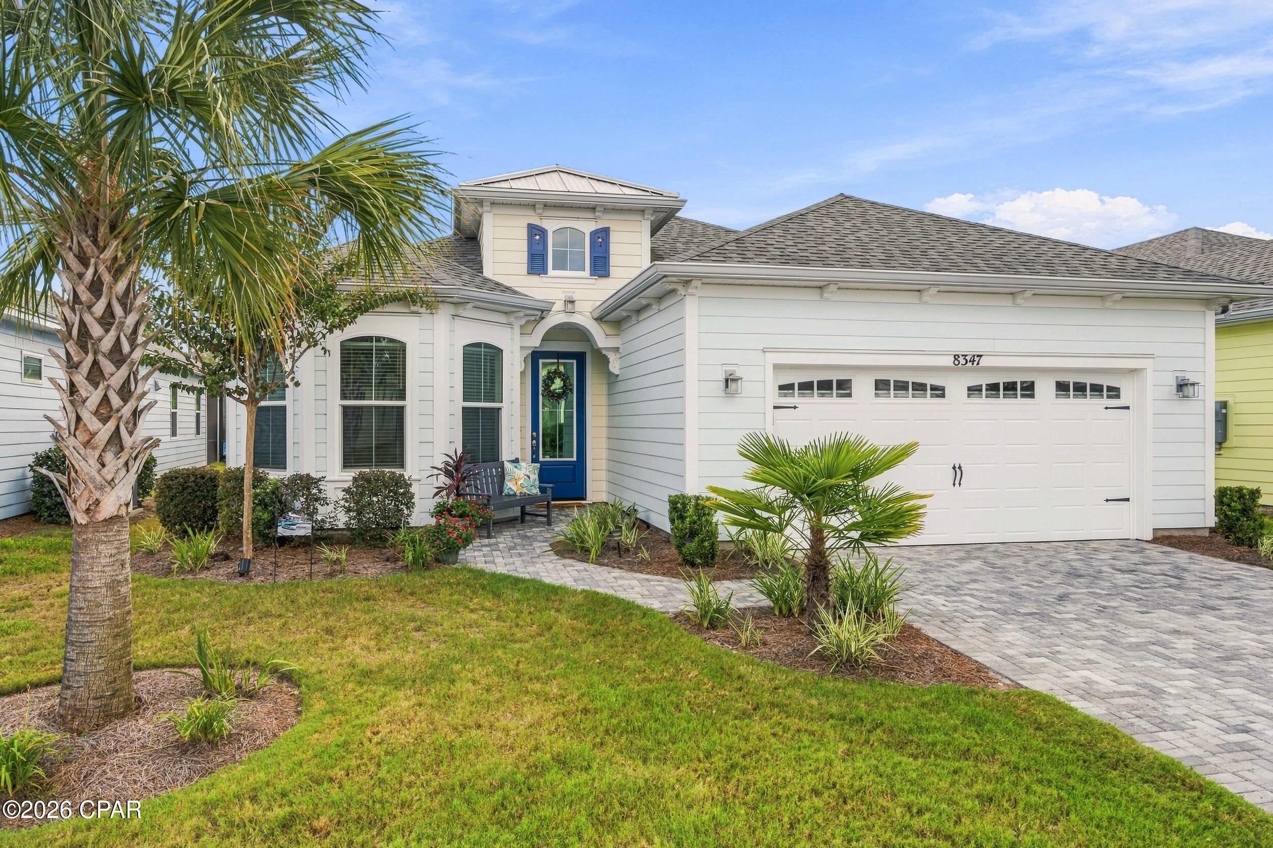 Spectacular sunsets, glistening water views and exceptional upgrades define this immaculate Breeze Bay! Perfectly positioned on one of the community's larger ponds with preserve beyond, the western exposure creates stunning sunset views directly over the heated saltwater pool and spa.
Inside, this beautifully maintained home is loaded with upgrades including Level 4 cabinetry with soft-close doors/drawers and kitchen pullouts, Level 3 countertops throughout, gas cooktop with hood package, upgraded appliances, 8' doors, fireplace, crown molding, shiplap accents, beamed ceilings, custom lighting and fans, and designer paint. The finished laundry includes cabinetry and sink package. Impact-rated garage and front entry doors add another level of quality. These sellers have done it all! Add to that list are overhead and attic storage systems in your finished garage. Your new home has the perfect combination of premium water and preserve views, beautiful finishes and resort-style outdoor living--all ready to enjoy and located in Phase 3C close to Margaritaville's famous amenities.