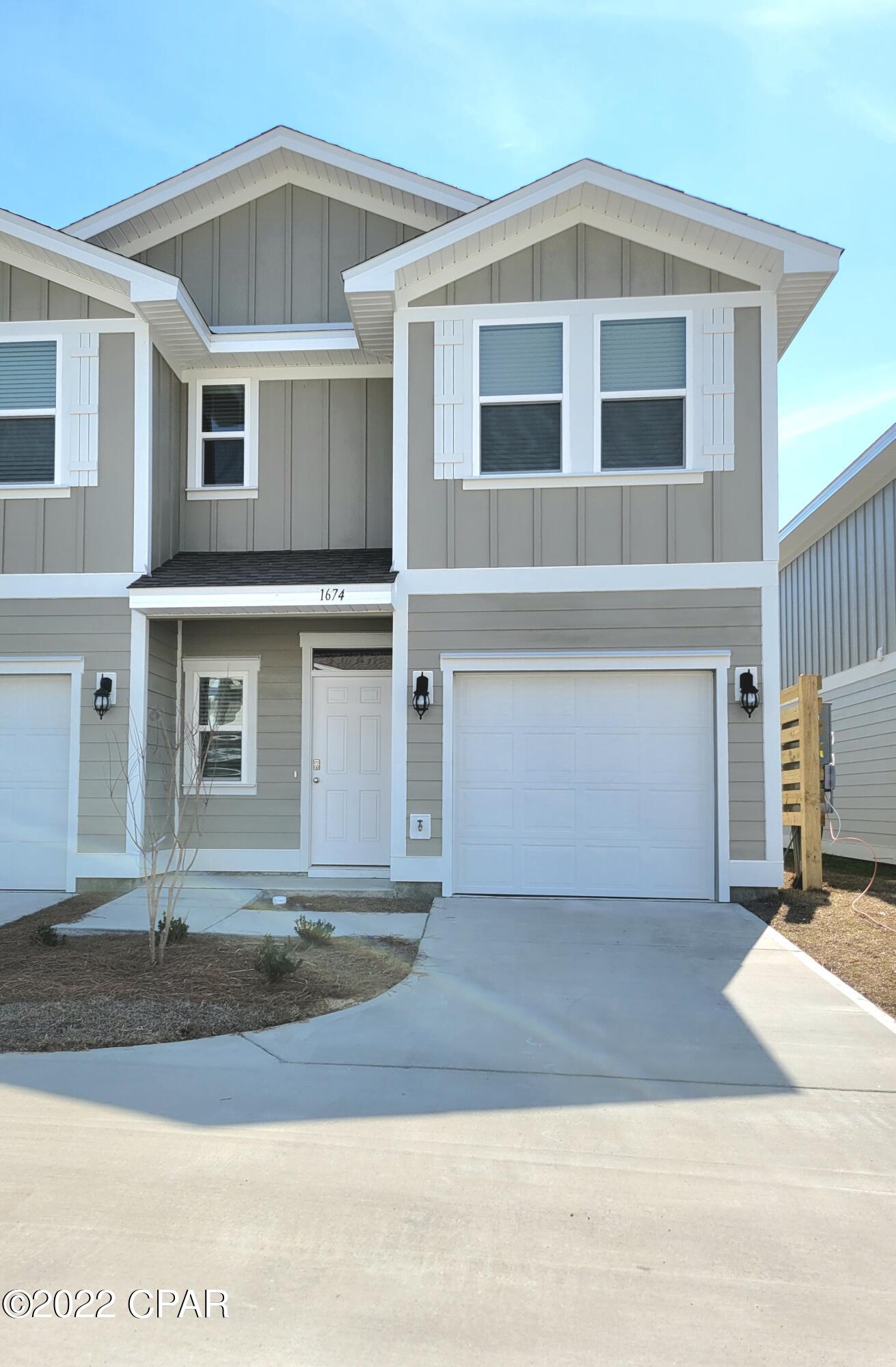 Brand new end unit townhome in the heart of Lynn Haven! Minutes to shopping, dining, great schools and more. Come live the maintenance free lifestyle w/no yard work! Downstairs the home features a nice size kitchen w/stainless steel appliances, granite counter tops, pantry, & breakfast bar that can seat 4. Living area downstairs is very spacious & you'll appreciate the half bath for your guests. Upstairs you'll find three bedrooms, full size washer and dryer, extra storage closets & a full bathroom. The master is enormous & boats a relaxing attached full bathroom w/a walk-in shower & double sink vanity. You'll love the huge walk in closet! Outside features a nice covered patio with a wide open green space/common area view. Very centrally located. 25 minutes to Tyndall AFB.
