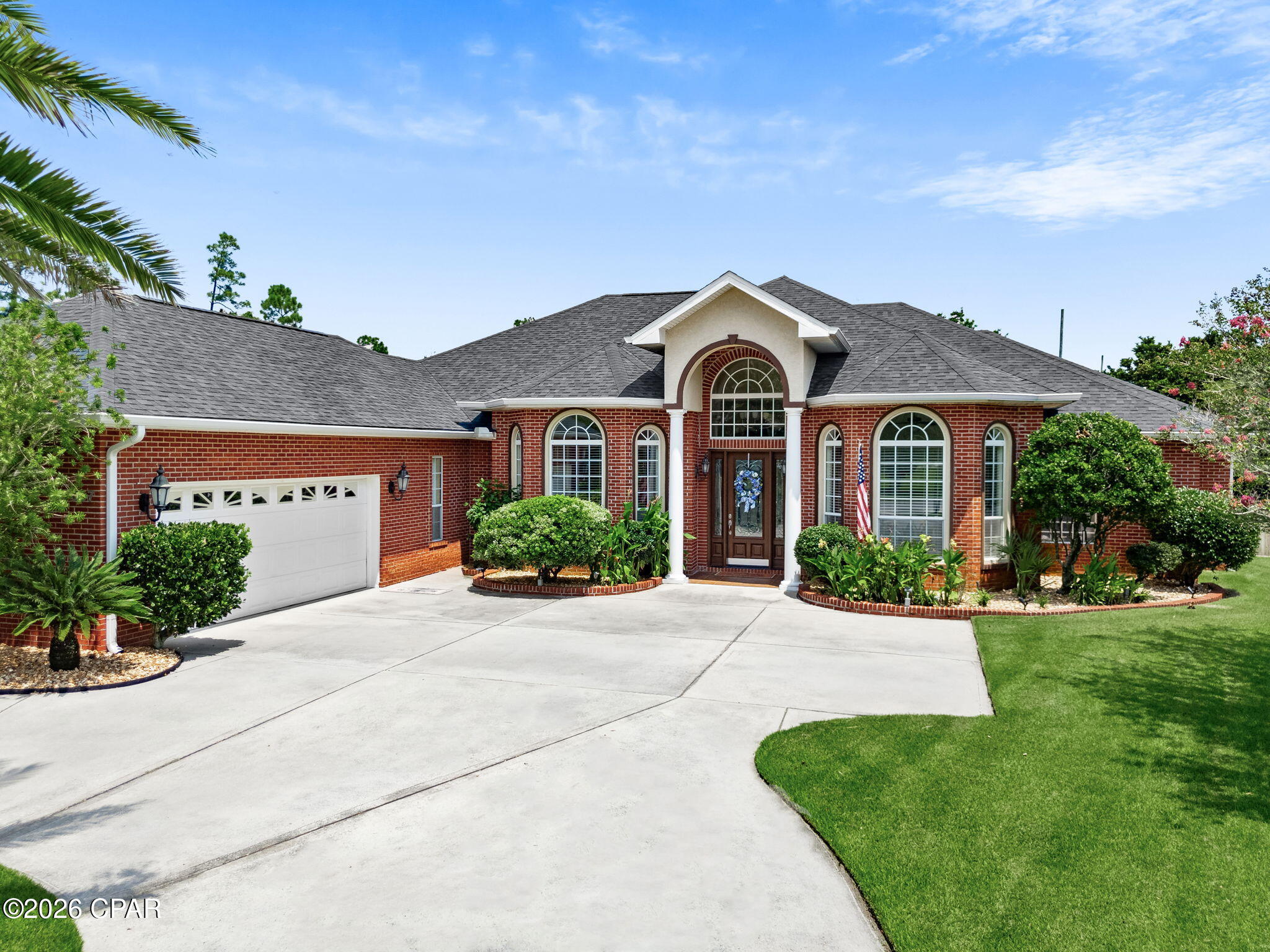 CURRENTLY UNDER CONTRACT, SELLER WILL CONSIDER BACKUP OFFERS - Located in the desirable Landings subdivision, this executive home, built by Tom Gladstone, showcases quality craftsmanship and thoughtful details throughout. Engineered hardwood flooring flows through the main living areas, while a detailed ceramic tile design beautifully defines the formal dining space. Plantation shutters throughout provide timeless style and added privacy.
The inviting living area features a gas fireplace, while the well-appointed kitchen offers granite countertops, stainless steel appliances, a gas range, and two pantries for abundant storage. The versatile fourth bedroom, complete with a full bath, offers flexibility as a private home office or guest suite. Bedroom closets feature additional storage space above, providing even more room for organization.  The luxurious primary suite is a true retreat, featuring detailed ceilings, a jetted Jacuzzi tub, a private water closet with bidet, dual vanities with granite countertops, and separate his-and-hers closets.
The garage features a nicely coated floor for a clean, finished look. Outdoors, enjoy the screened lanai with brick pillars overlooking the in-ground saltwater pool and beautifully maintained landscaping. A rear gate provides convenient access to the golf course and walking trails.
From the detailed interior finishes to the inviting outdoor living space, this well-maintained, move-in-ready home has so much to offer. Survey available. If measurements are deemed important, please verify.