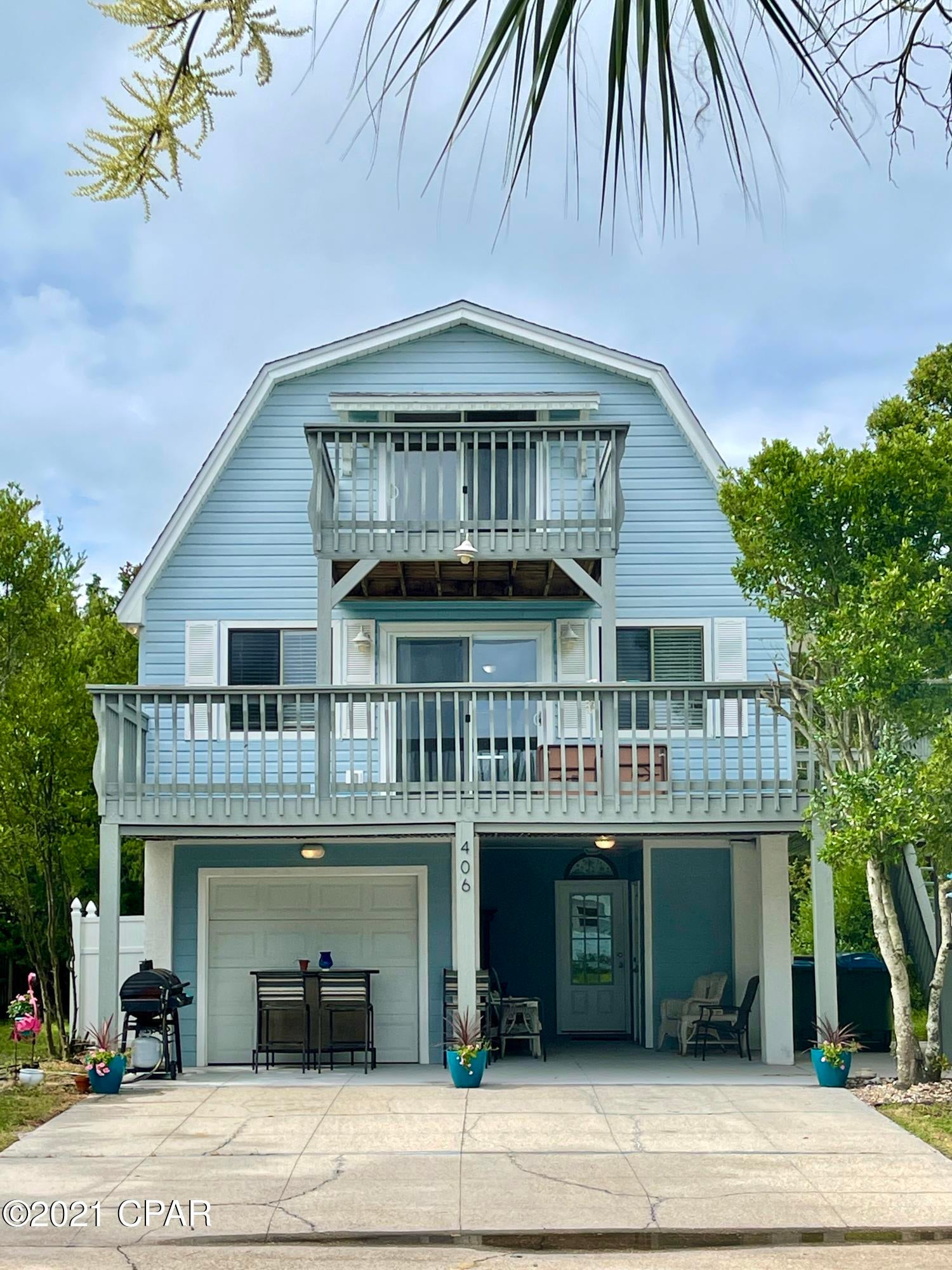'CURRENTLY UNDER CONTRACT, SELLER ACCEPTING BACKUP OFFERS' Three story home on a quiet cul-de-sac in BID A WEE Beach with Gulf View! Third block from the secured beach of Bid a Wee. ***more photos coming 7/9/21 ***This home features a Mother in law suite on the first level with a kitchenette and its own washer and dryer.  The second and third level are the main home with 4 Bedrooms and 3 bathrooms.  The second level opens up to the kitchen and living area and has two bedrooms each with its own private bath.  The third level has two more bedrooms and a hallway bath.  Home has recently been painted.  The HUGE backyard has a gazebo with a new cover for some relaxation! Lot is 157 feet deep and plenty of room for a pool.  All room measurements are approximate.