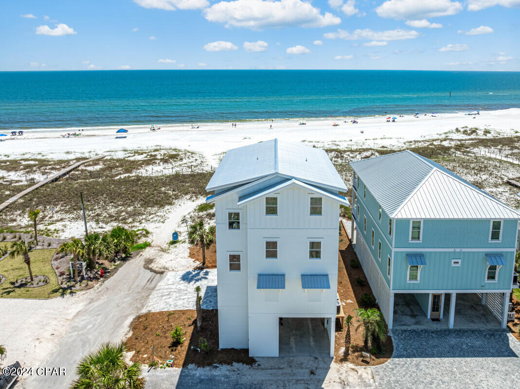 The Ultimate in Gulf Front Living! 2 blocks off of Hwy 98 for maximum safety, quiet and security. Newly constructed with a May 1st completion date, with quality construction. From the elevated private heated fully automated gulf front pool on the first level you'll enjoy amazing views of the gulf. The first level also features a large open concept living, dining, and chef inspired kitchen with large center island. The second and third levels of the home feature 6 large bedrooms, all with private ensuite baths with custom tile work. 4 of those bedrooms are gulf front with fantastic views.! Fully furnished and vacation rental ready, or use as a second or primary home.
4 Stop private elevator. The home also has extra spray foam insulation under the home, in the walls, and the ceilings for maximum efficiency. All 4 levels have fire protection sprinkler system. Exterior landscaping, paver driveway, well irrigation.